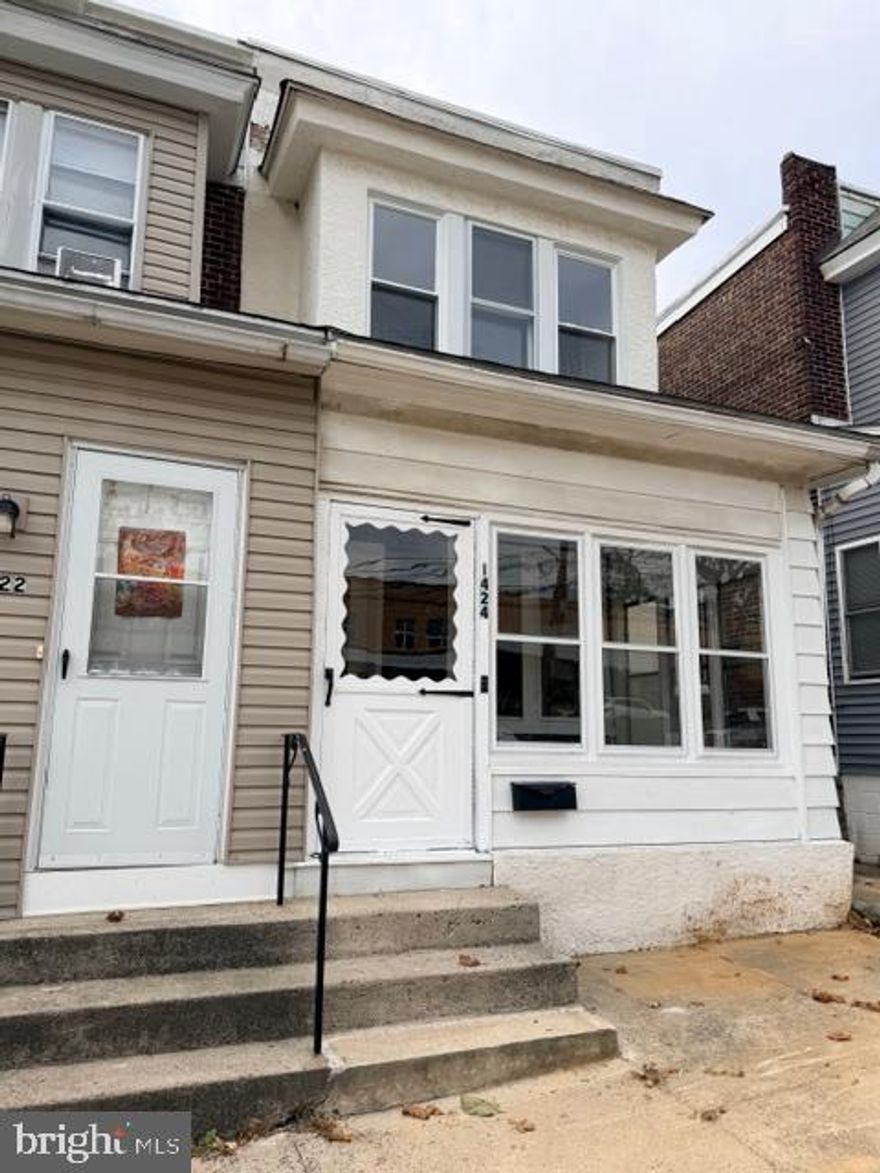 This charming twin home in the heart of Linwood offers a perfect blend of classic character and modern comfort. Built in 1936 and renovated in 2025, this residence features four spacious bedrooms and two full bathrooms, making it an ideal space for gatherings and relaxation. Step inside to discover new vinyl plank flooring that flows seamlessly throughout, complemented by upgraded countertops in the kitchen, which boasts a cozy table space for casual dining. The family room, conveniently located off the kitchen, invites warmth and connection. Outside, enjoy the level rear yard, perfect for outdoor activities or evenings under the stars. The property is situated across the street from Linwood elementary school in a neighborhood with sidewalks that encourage strolls and community engagement. Linwood is known for its welcoming atmosphere, with nearby parks offering green spaces for recreation and relaxation. With a city view and a prime location in the middle of the block, this home is not just a place to live, but a place to thrive. Close proximity to neighboring tax free shopping in Delaware. On-street parking adds convenience, while the unfinished basement provides potential for customization to suit your needs.