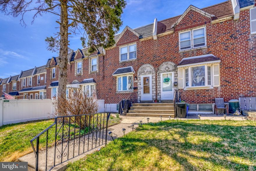 Another great opportunity to own in Pennypack gardens ! Dont miss out .  
  Nice front lawn and front patio .  Formal living room with hardwood floors , coat closet .  Formal dining room with hardwood flooring . Standard airlite kitchen with gas range , ceiling fan light , tiled walls. 
Finished basement with newer carpets , ceiling tiles , paneled walls  . Long hall to laundry area with laundry sink , washer and dryer . Gas hot water heater , forced hot air heater and central air .  100 amp breaker box . Exit to rear chain link fenced driveway and 1 car garage .  2nd floor offers rear bedroom 1 with hardwood floors , ceiling fan light , closet with attic access panel  , accent wall . Bedroom 2  with ceiling fan light , hardwood flooring , closet . Beautiful newer modern hall bathroom (2022) with ceramic tiled walls and floors, new cast iron tub , granite top sink ,vanity , tushy bidet  toilet  , large linen closet , and skylight . Primary bedroom with large wall closet with barn style doors , 2 additional closets , ceiling fan light ,  accent wall . Mostly newer 6 panel interior doors through out  , double pain vinyl windows through out .
Close and convenient  to I95 , Betsy Ross to NJ , center city , NE shopping malls and restaurants , Holy Family College , Union League Country Club , Linden ave boat ramp and much much more !!!

Schedule your private tour today !!   Make this home  yours !!