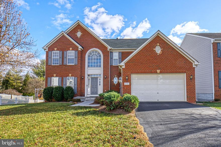 Call this beautiful house your home.  With 3 finished levels and 4000+ square feet, there is a place for everyone and everything here.  Enter through the grand, two-story foyer on hardwood floors.  On the main level is a large kitchen with plenty of counter and storage space, a bright and cheery sunroom, family room with fireplace, formal dining room, and formal living room.  Upstairs is a huge owners' suite, 3 secondary bedrooms and a hall bath.  Plenty of room for play or relaxation can be found in the basement with a great room large enough for the included pool table plus other games and an additional family room area with wet bar, wine cooler, small fridge and more cabinet storage.  Exit to the patio and lush backyard.  You will not find a more peaceful, rural setting with everything you could need nearby.  Don't let this pass you by!