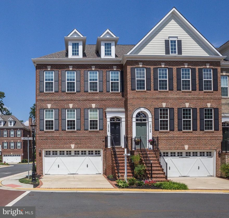 Stunning all-brick end unit townhome in immaculate condition & 4 years young!  Nestled in the charming community of Cameron Glen near Old Town FFX.  Beautiful upgraded hwd flrs, gourmet kitchen w/ stainless, granite & white cabs, upgraded baths, closets and rare full ba on lower lvl.  Light & bright with deck off the main lvl and patio walk-out off lower lvl.  All the ammentieis you could ask for!