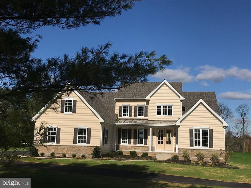 The Montgomery on homesite #01 with 3 Bedrooms, 3 Baths, full basement and 3 car garage.