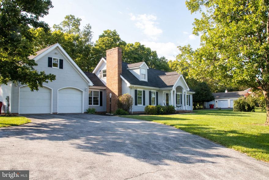 MULTIPLE OFFERS HAVE BEEN RECEIVED.  AGENTS PLEASE HAVE YOUR OFFERS IN BY WEDNESDAY 8/28 AT 10AM.  Fabulous Cape Cod in Carriage Park that offers a warm and inviting lifestyle.  Step into the foyer and immediately feel the warmth with the Family Room off the entry with the wood burning/propane fireplace with expansive mantle perfect for fall evenings.  The large kitchen offers expansive cabinets, bar area, pantry cabinets and loads of workspace.  A spacious breakfast room affords room for not just a table but other furnishings as well.  Step out onto the expansive deck from the breakfast room and enjoy your coffee on crisp mornings.  From the dining room, you can soak in a peaceful evening on the screened in porch.  Expansive laundry room boasts a 1/2 bath.  This garage is perfect for those who want extra space, with a third garage space added to the back of the main garage.  There is also storage space above the garage. Step down to the basement for  additional living space, while still maintaining some unfinished space for storage.  Outside, there is plenty of room for gardens.  This is the perfect neighborhood for those who need to commute to Maryland or Northern Virginia, or for those who want a quiet country experience.  Call today to schedule your appointment.