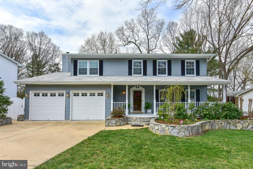 3300+ Sqft of Classic Colonial - with a very special feature:  15x20 Sunroom w adjacent Deck and Outdoor Kitchen!  Private lot on v. quiet street.  5 Bedrooms upstairs, 2.5 Fully renovated baths, Fam Rm off Kitchen, Upgraded inside kitchen (Stainless & Granite), Bellawood cherry floors.  Covered front porch, and extensive stone planters.  Did I mention the Outdoor Kitchen???  W/ a roof over it?