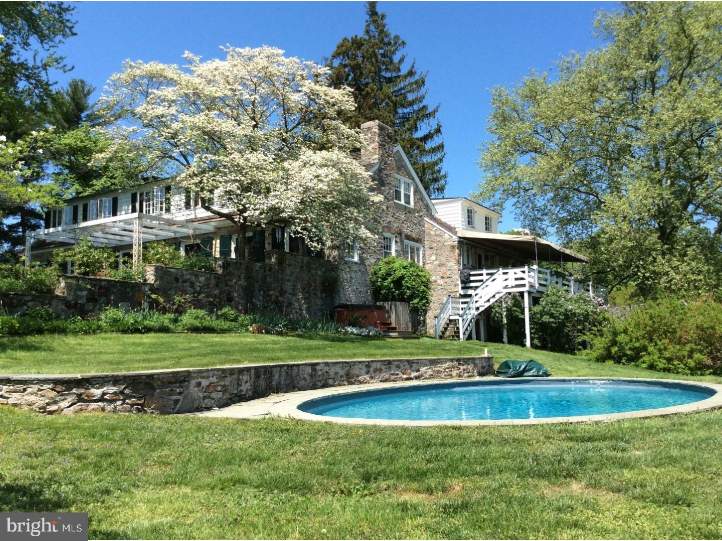 Beautifully situated Pennsylvania fieldstone home and barns, dating from 1925 with documented architectural significance. Sensitively placed in a landscape surrounded by miles of conserved land, the house features six bedrooms, five full baths, a large living room, dining room and library, all with fireplaces and French doors to a southern flagstone terrace with expansive and completely protected views. There is a separate bar, office and powder room on the first floor and a large kitchen with a sitting room and breakfast area, opening to a covered porch with stairs to the swimming pool. An enormous pond, six stall barn with two apartments over the attached 3-bay heated garage, greenhouse, new equipment buildings, and original stone spring houses add to the composition of this several generation held estate. A 67+ acre sanctuary hosting the headwaters of the wild and scenic White Clay Creek, providing studied and unlimited supplies of the purest water in the region. Located at the corner of Lamborntown and Upland Roads in West Marlborough Township, ownership of this quiet preserve is truly a once in a lifetime opportunity. Easy commute to Wilmington, DE and close proximity to Kennett Square, PA. Added benefits include the famed Unionville Chadds Ford school district and Mr. Stewart's Cheshire Fox Hounds.