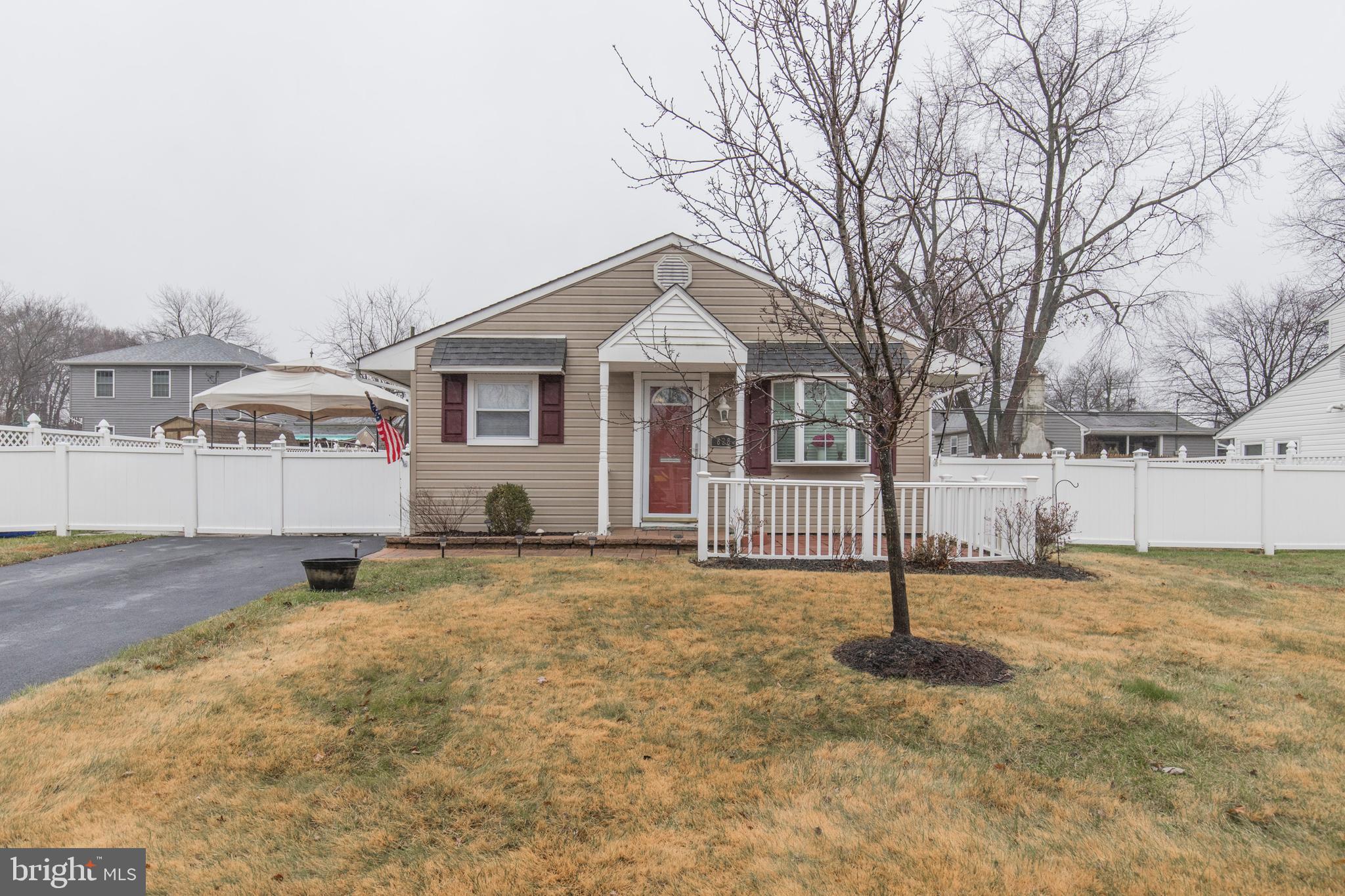 New Price! Welcome home to this absolutely beautiful 3-bedroom ranch nestled in the Fairless Hills neighborhood. Located in the award winning Pennsbury School District! This home has been meticulously cared for and nicely updated both inside and out! An extended driveway that can easily fit two cars leads to the paver sidewalk and front porch area. Add a set of rocking chairs and enjoy the front patio this spring. Enter directly into the large living room complete with loads of windows to allow natural light to stream in. Newer flooring has been installed throughout the entire home for a cohesive look and pops nicely against the neutral paint. The wall between the kitchen and living room has been opened and transformed into a breakfast bar with pendant lighting above. Keep an eye on guests while entertaining or enjoy a quick meal before running out. The kitchen includes ceramic tile flooring, granite countertops and tile backsplash. Appliances include gas range, built-in microwave, dishwasher and French door refrigerator that s only 3 years old. The dining area is in the kitchen and provides views through the glass patio doors to the backyard. If you enjoy outdoor entertaining, this layout it perfect! The cement patio is just outside the kitchen and is large enough to hold an outdoor dining set and BBQ grill! The entire backyard is surrounded by white vinyl privacy fencing, making it feel like your own private oasis. There is plenty of open yard to add a play set, extend the patio, create a garden/flower bed or leave open to enjoy lawn games or let your furry family members roam. Two sheds are situated in the backyard as well to house outdoor furniture and equipment for extra storage. All three bedrooms include laminate flooring, ceiling fans and receive great sunlight. The two spare bedrooms feature crown molding! The laundry room fits side-by-side washer/dryer (only 1.5 yrs old) and includes additional cabinetry for storage. The bathroom has been beautifully updated with beadboard detailing, decorative chair-rail, newer mirror, oversized vanity, and the shower/tub includes a tile surround. The roof was replaced in 2011 and the hot water heater and HVAC were installed in 2013. Within walking distance to Pennsbury High School. Surrounded by shopping & restaurants, close to Rt. 1 and I-95 and only a 3-mile drive to Sesame Place. If you are looking for a move-in ready home in Pennsbury School District, this is it! Give us a call today to schedule your private tour.