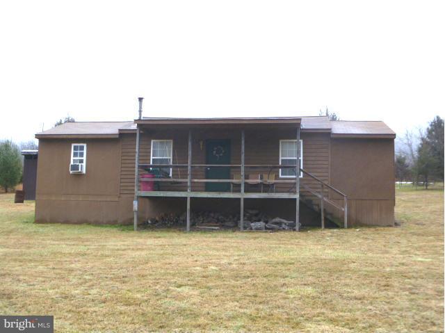 Perfect setting for those who enjoy the outdoors, scenic views and access to the GW National Forest. Cozy two bdrm cabin in great community with all the comforts of home. Furniture conveys as well as riding lawn mower in outbuilding. Priced below the market for a quick sale.