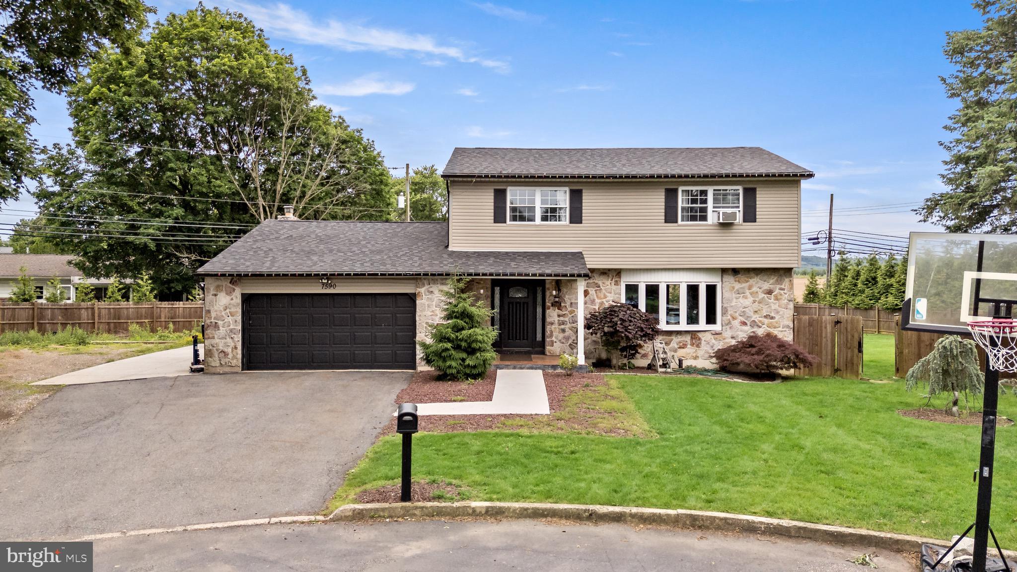 **PROPERTY WILL BE AVAILABLE TO MOVE IN AUGUST 1ST, 2025**Spacious, Fully Renovated Colonial Home for Rent in East Penn SD! Located in a quiet cul-de-sac within the highly sought-after East Penn School District, this beautifully remodeled single-family colonial in Macungie offers space, style, and comfort. Featuring 4 generously sized bedrooms and 2 full bathrooms, this home showcases modern upgrades throughout—including recessed lighting, luxury vinyl flooring, and a stylish open-concept kitchen and dining area with granite countertops, stainless steel appliances, a gas cooktop, and built-in electric oven and microwave. Enjoy the convenience of first-floor laundry, a full bath, and a cozy family room with an electric fireplace. Outside, the fenced-in private yard and two-car garage provide privacy and practicality. The full basement offers ample storage space, and the economical gas heating system with a tankless 2-in-1 unit ensures energy efficiency year-round. Pets may be considered on a case-by-case basis with an additional fee. Don’t miss the chance to call this stunning property home!