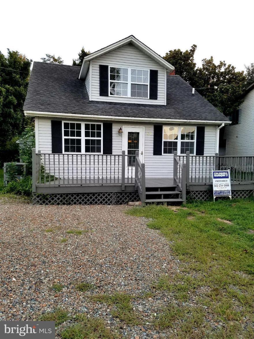 Now is your opportunity to live in a water oriented community with water rights, club house, community beach, pier, and pole club for all you boaters.  There is a voluntary HOA if you want to participate in all the boating activities and there are slips available.  The house has been freshly painted, rehabbed in 2007 and being sold as-is to finalize mother's estate.  This is a year round community