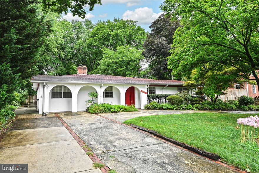 Step into this exquisite single-family home nestled in the coveted Woodside community, boasting a captivating blend of Moroccan and Spanish architectural influences. Perfectly situated mere steps away from the metro station and the vibrant downtown Silver Spring, this residence offers unparalleled convenience and access to an array of shopping and dining options.  Featuring three bedrooms and three and a half bathrooms, this home epitomizes comfort and elegance. The seamless flow of beautiful hardwood floors throughout creates a warm and inviting ambiance. A central solarium floods the entire house with natural light, serving as a delightful entertainment space.  The layout encompasses a home office, a spacious living room, a cozy family room, a formal dining room, and a well-appointed kitchen. Additionally, an enclosed Florida room off the kitchen provides a charming retreat for dining or relaxation. Step outside to discover a picturesque and expansive lawn, ideal for outdoor gatherings and activities.

This home also offers potential for further customization, with an unfinished lower level already plumbed for a full bathroom and kitchenette. Many renovations including the primary bathroom, 2nd bathroom, wood replacement in the Florida room, ceiling replacement and modernization with recessed lighting, as well as paining the entire house..  While being sold in as-is condition, this move-in ready residence presents a remarkable opportunity for those with a vision to transform it into their dream home. Don't miss the chance to make this stunning property your own.