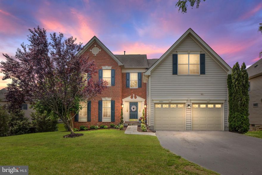 Beautiful Toll Brothers York Model home in sought after South Riding, that you won't want to miss!  
*ALL OFFERS DUE BY 5PM 2/26
Perfectly located, nestled at the end of a cul-de-sac on a larger homesite awaits this beautiful four-bedroom, single family home with a walkout basement and deck.  Enjoy the comforts of quiet cul-de-sac living with backyard and oversized side yard lined with mature trees.  Enter through the front door into a grand, two-story foyer with hardwood floors and beautiful upgraded chandelier. The main level provides ample space for family and entertainment with large, extended family room with vaulted ceiling and wood-burning fireplace. The spacious kitchen with larger island, ample cabinets and custom pantry are perfect for preparing food to enjoy in the large eat-in breakfast area. The main level also includes a formal living and dining room, a private office perfect for working from home or as a toy room. The large deck off the kitchen provides an additional space for entertaining and relaxing. Upstairs presents a large primary bedroom with cathedral ceilings, double walk-in closets and large spa-like bathroom with dual sinks, large soaking tub, and shower.  Three additional spacious bedrooms are provided upstairs with upgraded custom Elfa closet systems, and another full bathroom with dual vanities. Large, open, walk-out basement provides a rough in and a blank canvas to create your very own dream basement.
Children will attend the highly rated Cardinal Ridge Elementary school, J. Michael Lunsford Middle school, and Freedom High school. The new St. Paul VI private school is located 1.5 miles away/
The South Riding community is a beautiful tree-lined community with a wealth of amenities and annual events. You have your choice of 4 different outdoor pools, including one with a child’s water park and water slides, 10 playgrounds, 4 tennis courts, and miles of biking and walking trails. Annual events include outdoor summer movie nights and Friday night concerts in the park. South Riding is also home to the Dulles South Recreation and Community center with indoor swimming pools, lazy river, fitness center, sport court, rock climbing wall and outdoor skate park.   
Conveniently located near Dulles Technology Corridor and just 10 miles from horse country, strawberry fields and vineyards.