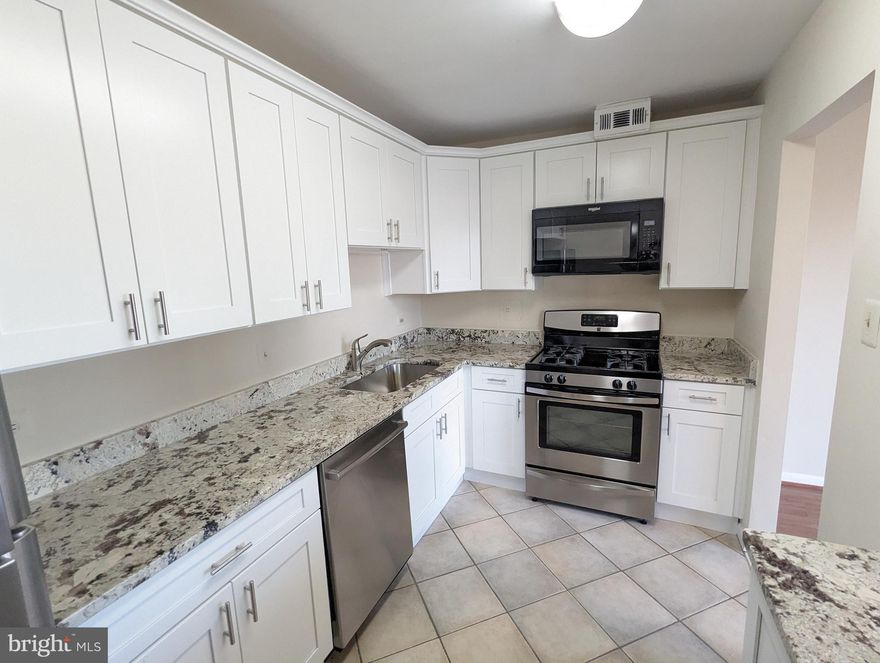 Updated condo in a well-maintained building in downtown Bethesda. Beautiful hardwoods, updated kitchen appliances, and renovated hall bathroom. Garage parking space included. Balcony views to the east, and natural light in the bedrooms and living area. Large walk-in closets. Includes ground-floor storage as well. Great unit in a great location!
