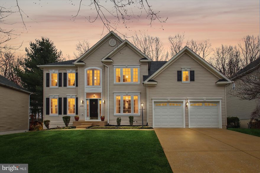 Don't miss this stunning light-filled home backing to a woodland preserve in the highly desirable Village of River Hill.  The private level lot offers the perfect oasis for entertaining, recreation, or simply enjoying nature.  Sip your coffee on the sunny patio or host a barbecue on the expansive deck overlooking magnificent parkland, all while your luscious lawn and gardens remain green with the built-in irrigation system.  This gorgeous 4956 sq ft home has been meticulously maintained and features gleaming hardwoods, soaring ceilings, atrium windows, 5 bedrooms, 3.5 bathrooms, 2 kitchens, a whole-house generator, and updates galore.  The 2-story foyer provides a grand entrance with a sight line all the way to the back of the home and its lovely, wooded view.  To the left of the entrance is a formal living room with hardwoods and crown molding, and to the right of the entrance is a formal dining room with hardwoods, crown molding and chair rail.  As you proceed down the center hall, you enter a spacious family room with soaring ceilings, a wall of windows, surround sound and wired speakers, and a cozy gas fireplace.  To the left of the family room are French doors to a private office with hardwoods and a sweeping view of the backyard.  To the right of the family is an open gourmet kitchen with center island, 42" white cabinets, stainless steel appliances, gas cooktop, Wi-Fi enabled double oven with convection, microwave, dishwasher, French-door refrigerator, pantry, dining space, and built-in desk.  A sliding door from the kitchen provides access to the low maintenance deck with cocktail rail and built-in spigot. In between the kitchen and dining room is a butler’s pantry with wet bar, perfect for entertaining and serving.  Beyond the kitchen is a renovated powder room, main level laundry, and access to the 2-car garage with Wi-Fi enabled openers.  The upper level offers 4 spacious bedrooms, all with hardwood flooring, ceiling fans, and generous closets.  The expansive primary suite features a sitting area, gas fireplace, renovated walk-in closet, and a renovated en-suite with upgraded flooring, light fixtures, floating double vanity, water closet, glass enclosed shower, heated towel rack, and large jetted tub.   An additional hall bathroom on the upper level offers a double vanity and bathtub with shower.  The lower level of the home contains a fully permitted accessory dwelling unit (ADU) with a walkway to a separate entrance, living/dining room, full gourmet kitchen with stylish gray cabinets, stainless appliances, and granite counters, second laundry, full bathroom with large walk-in shower, and the fifth bedroom.  This space can be used as an ADU to generate income, as an in-law suite, nanny suite, or guest space, or simply as a fabulous entertainment space to host your super bowl party, game night, or birthday celebration -- the possibilities are endless.  Enjoy all the perks of River Hill living including nearby stores and restaurants, an excellent school system, bike trails, walking paths, tot lots and playgrounds, community center, optional pool membership, and all the amenities and memberships available in the Columbia Association.