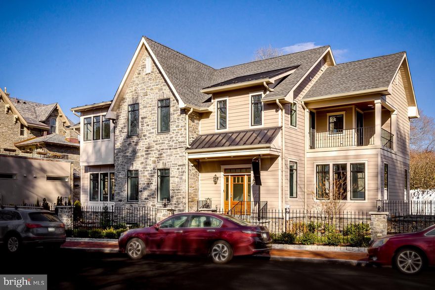 Welcome home to this exceptional house in desirable top of the hill location. This thoughtfully-designed new construction house built by premier local builder, Main Street Development, features a floor plan for today's living with architectural details and design of Chestnut Hill's stately older homes. Enter into a gracious marble foyer. Step up to a grand living room with custom coffered ceiling, gas fireplace and walls of windows affording incredible natural light. Open-concept dining room plus Chef's Eat-in Kitchen with custom cabinetry, large island great for entertaining or daily dining, Sub-Zero/Wolf appliances. Gracious hallway with rear yard access plus formal powder room complete this floor. Upstairs features 4 bedrooms and 3 full bathrooms. Enter into the large master suite with spacious Master BR with open sitting area that would make for a great home office with step-out balcony. Fabulous spa-like marble master bathroom with step-in shower, custom double vanity, separate water closet and soaking tub. Large walk-in closet with custom built-ins. Large corner guest suite with fabulous en-suite bathroom. 2 additional large guest rooms plus hall bathroom plus convenient laundry room. Finished lower level with large media room/home gym/play room/home office could be designed to create a 5th BR plus entertaining room full bathroom and second laundry room would make for great au pair/in law/guest quarters. mud room with custom built-in bench and cubbies. Access to attached 2-car garage and heated driveway. Incredible location walk able to all that Chestnut Hill has to offer plus several trains stations. Easy access to Center City, suburbs and major highways. 10 year tax abatement. Truly exceptional home brought to you by former Philadelphia Magazine Design Home Builder.