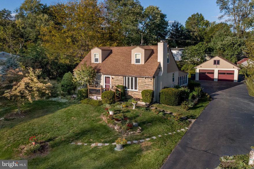 Welcome to this beautifully maintained 3-bedroom, 2-bath Cape Cod home, featuring an oversized 2-car detached garage, located on a quiet street in the highly desirable Council Rock School District.  From the moment you step inside, you’ll appreciate the open-concept layout. The spacious family room with a cozy fireplace seamlessly flows into the dining area and kitchen, creating the perfect space for both everyday living and entertaining.  Beyond the kitchen, you’ll find an additional sunlit living space with a stunning 180-degree view of the backyard—ideal for relaxing or hosting guests. This bonus room also provides access to the basement via a separate staircase.  The first floor includes one bedroom and a full bathroom, perfect for guests or convenient one-level living. Upstairs, you'll find two more generously sized bedrooms and a second full bathroom.  Don’t miss your chance to own this beautiful, well-priced home in a prime location—schedule your showing today!