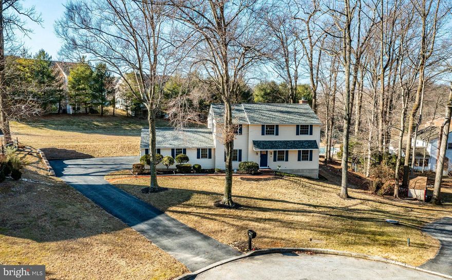 PLEASE NOTE:   All Offers Are Due Tuesday, March 18 at 2:00 pm - Thank you.  At last, your wait is over!  Welcome to 10 Edgewood Drive, a spectacular, updated and move-in ready home located in the desirable Woodmont community of Downingtown and in the award-winning Downingtown East School District!  This beautifully maintained 4-bedroom, 2.5-bathroom Colonial on an approximately ½ acre lot is nestled in a quiet cul-de-sac and conveniently located just off Route 113.  Enjoy the perfect blend of privacy and accessibility, with easy access to shopping, dining, entertainment and recreation!  From the charming brick front walkway, step inside the foyer to discover beautiful, refinished hardwood floors (2024) that add warmth and elegance to most of the main level.  The thoughtfully-designed layout includes a formal living room and formal dining room, while the spacious, open-concept kitchen and family room creates the perfect space for everyday living.  Natural light floods through the kitchen’s charming bay window into the breakfast nook, making it an inviting spot to start your day!  Enjoy gas cooking, high-end stainless steel appliances, recessed lighting and a window that overlooks the backyard.  The family room, anchored by a brick-encased gas fireplace, is a cozy retreat for gatherings.  One of the home’s standout features is the incredible sunroom, a true haven with a dramatic and warm wood-clad ceiling, skylights, a direct-vent gas stove and recessed lighting.  Whether you’re entertaining or playing with the kids, this space offers year-round enjoyment.  Completing the first floor is the laundry room with sink and an updated half bath.   Upstairs, the primary bedroom suite boasts ample space, a walk-in closet, and en suite bath, while three additional bedrooms share a well-appointed hall bath.  The second floor also features classic and rich hardwood floors.  The mostly-finished basement expands your living space with new flooring, offering a versatile area for a home office, playroom, hobbies or fitness space.  You won’t need a gym membership once you bring in your fitness equipment!   Step outside the sunroom through the sliding glass doors to a large Trex composite deck, perfect for outdoor dining.  The fenced-in backyard also features a privacy fence, patio and shed, making it an ideal retreat for both relaxation, play and pets!  Please note the property extends beyond the fenced-in yard.  The attached 2-car garage with inside access provides convenience for unloading packages, and the sprawling driveway easily accommodates 5+ cars.  Meticulously maintained this home includes MANY UPDATES:   A newer furnace and A/C unit (2019), a newer roof installed with 55-year shingles (2019), an upgraded 200-amp electrical panel (2020), a new chimney cap, crown and flue liner (2022), enhanced attic insulation (2023), and newly-installed basement flooring (2023-2024).  The refinished hardwood floors (2024) and LVP flooring at the rear entrance complete the numerous updates.   This gorgeous home is minutes from Wegmans and the Brandywine Square Shopping Center, the Downingtown Farmers Market, and the Lionville Shopping Center, offering convenient access to groceries, retail stores and essentials.  Enjoy dining at The Pour House, Victory Brewing Company, Station Taproom, and Anthony’s Coal Fired Pizza or grab coffee at The Farmhouse!.  Outdoor enthusiasts will love being close to Kerr Park, Marsh Creek State Park, and Struble Trail, perfect for hiking, biking, and family outings.  You’re minutes from the Whitford and Downingtown Country Clubs.  Plus, easy access to Routes 113, 30 & 100, the PA Turnpike and the Downingtown Septa and Amtrak station making commuting a breeze to Center City, Philadelphia or Harrisburg.  Please view our custom VIDEO highlighting this home’s incredible features, and contact me to schedule your private showing!   Don’t miss the opportunity to make 10 Edgewood Drive your own oasis!