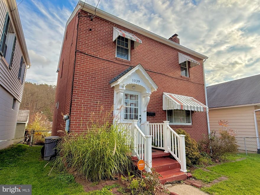 Welcome to 1039 Myrtle Street! This two-story brick home features three spacious bedrooms, two full baths, and expansive living areas with hardwood floors throughout. Perfect for the holidays, it boasts a large kitchen with ample counter space and storage. Included are a refrigerator, range/oven, microwave, and dishwasher. Enjoy the warmth of the cozy fireplace and the convenience of a flat yard leading to the garage and driveway. Create your own all-seasons sunporch into an office or workout space.  Experience the ease of living close to downtown attractions. This move in ready home is a must see!