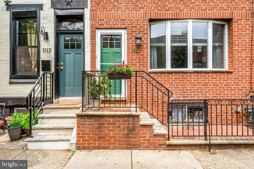 Welcome to 1115 Moore Street, a beautifully updated home in the heart of South Philadelphia’s vibrant East Passyunk neighborhood. From the moment you arrive, you'll appreciate the gated front area—perfect for storing bikes, strollers, or other outdoor items. Step inside through the charming vestibule featuring a stunning original wood door, and you’re welcomed into a bright and airy first floor with soaring ceilings, gleaming hardwood floors, and abundant closet space. The open-concept layout seamlessly connects the spacious family room and dining area, creating an inviting space for everyday living and entertaining.

At the back of the home, the completely renovated kitchen is a true showstopper. It features white cabinetry, a classic subway tile backsplash, sleek stainless steel appliances, a large center island, and luxurious marble countertops that extend to a sunny windowsill. A rear door leads out to the fenced-in private yard, complete with a raised garden bed—perfect for relaxing, gardening, or entertaining guests outdoors.

Upstairs, you’ll find three spacious bedrooms drenched in natural light, along with a renovated full bathroom that includes a large vanity, tiled flooring, and a tub/shower combination with timeless finishes. The finished basement offers additional versatile living space—ideal for a den, playroom, or home office—as well as a half bathroom, dedicated laundry area, and plenty of storage.

Situated just steps from Passyunk Avenue, 1115 Moore offers unbeatable walkability to some of Philadelphia’s best dining, coffee shops, boutiques, and parks. Enjoy neighborhood favorites like the Singing Fountain, Bok rooftop, Cantina Los Caballitos, and Termini Bros, or take a quick stroll to Columbus Square Park and the South Philly Co-Op. With convenient access to public transportation and major roadways, commuting to Center City or exploring other parts of the city is a breeze. This home is the perfect blend of thoughtful updates, functional living space, and a prime location in one of Philadelphia’s most beloved neighborhoods.
