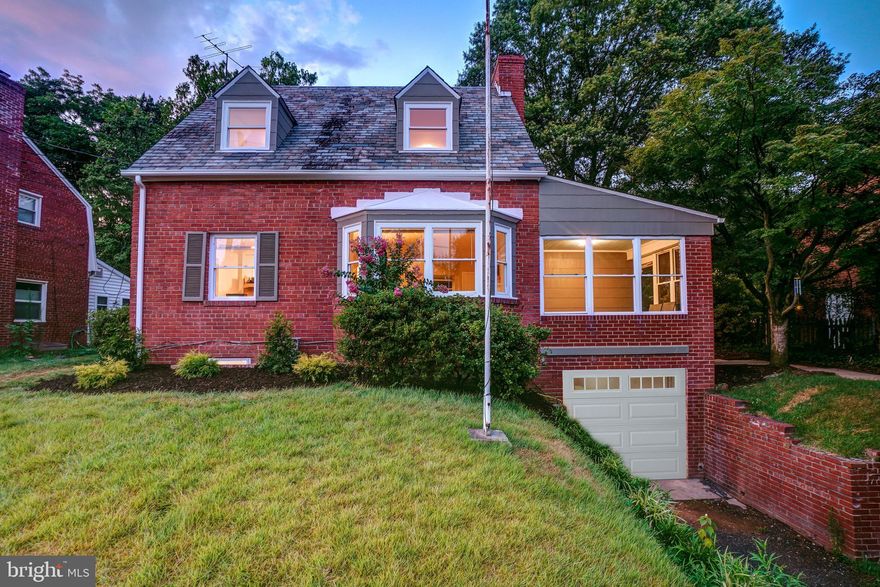 Welcome to this picture-perfect updated Cape Cod home in the delightful Kilmarock neighborhood of Takoma Park. Built in 1938, this charming residence showcases an array of beautiful architectural features, including refinished wood floors, a large bay window, and charming dormers. The home features an entry sunroom drop zone area, a light-filled living room with a brick fireplace, and a dining room that seamlessly opens to the sleek kitchen with new stainless-steel appliances, quartz counters, new cabinetry, and access to the backyard. The main level is complete with a bright bedroom with backyard views.
Upstairs, you'll find two sunlit bedrooms with dormers and an updated bathroom. The lower level includes a versatile office/guest room with a glass pocket door, a bonus room, a full bathroom, a laundry area, and access to the garage. This property offers the convenience of a private driveway and an attached garage with a brand-new garage door. Outside, there is a generous fenced backyard and a slate roof.
Enjoy living in eclectic Takoma Park; the location offers all the allure and convenience of this very special area. Relish the warm sense of community as well as ready access to trails, shops, restaurants, and entertainment in both Takoma Park and vibrant downtown Silver Spring. Near Long Branch Trail and playgrounds, with easy access to transit.
