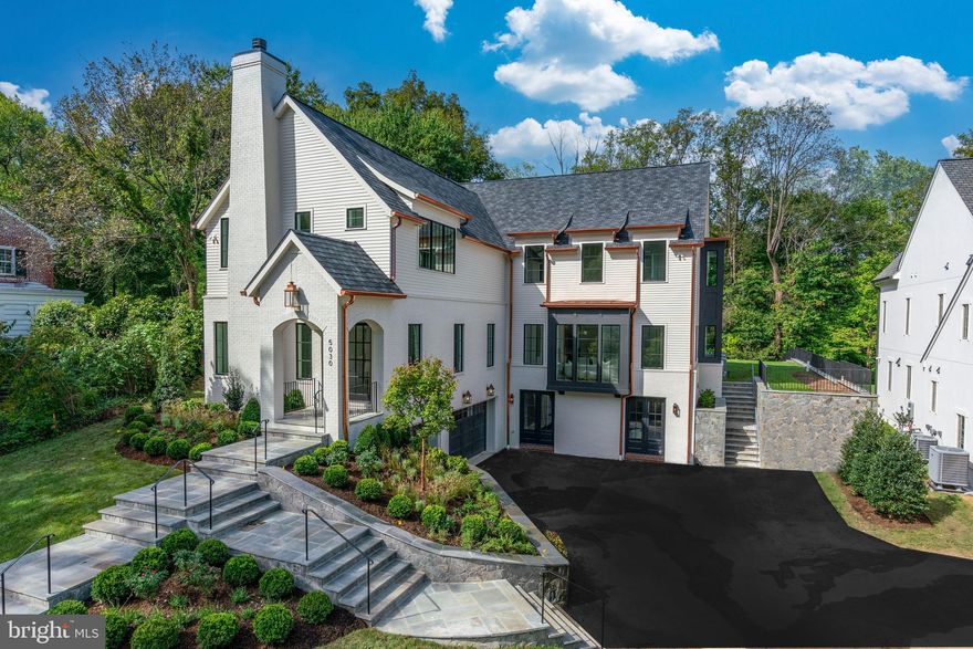 Another brand-new stunning residence by Brush Arbor Home Construction!  In collaboration with MV Architects and Wellhouse & Co Interior Design, Brush Arbor has created a bespoke residence sited on a coveted .38 acre lot in prime Forest Hills that backs up to parkland!  Rear garden is level and is pool ready!  Lovely exterior details like copper gutters and a classic painted brick chimney and bay windows lend exceptional touches of elegance to this custom new build and design, spanning 5 BR, 5 FBA, 2 HBA and approx. 7,733 SF.
 
French windows and doors anchor all the primary spaces, yielding bucolic views. Gorgeous herringbone floors in the front foyer welcome guests into a light-filled floor plan that integrates 10' ceilings, custom interior and exterior millwork and architectural details, 7” rustic white oak floors, Jeld Wen windows, elevator to all three levels, three-car garage, designer finishes such as lighting by Visual Comfort, hardware by Emtek and fixtures by Brizo, bespoke wallcoverings, and natural finishes such as black honed granite, white carrara marble and polished nickel.  
 
The second level includes an expansive primary suite featuring specialty trim with reeded detail, two walk-in-closets, and the designer tile and custom cabinetry of a spa-inspired bathroom. Secondary bedrooms echo the pattern of discerning finishes, all with ensuite baths and walk-in closets. The lower level boasts a daylight recreation room with bar and the central stair hall also brings plenty of natural light into the mudroom adjoining the three-car garage.
 
Located in Washington, DC’s premier Forest Hills neighborhood with easy access to amenities of Connecticut Ave commercial corridor including Politics and Prose, Comet Ping Pong pizzeria, I’m Eddie Cano, Italian Bar, CVS, etc.  Convenient to Downtown Washington, Georgetown, and Maryland Suburbs. The Kennedy Center, White House and some of the country’s best universities including American University and Georgetown University are just minutes away. Reagan National and Dulles International airports are a quick commute.