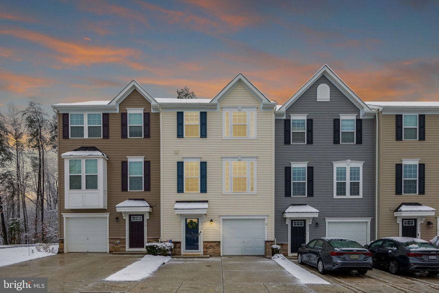 Beautiful and well-maintained 3-level townhome in Spotsylvania offering modern comfort and peaceful wooded views. The main level features an open-concept layout with a spacious living area, large windows for natural light, and a bright kitchen with stainless steel appliances, ample cabinetry, and a center island perfect for entertaining. The dining area opens to a private deck overlooking a serene tree-lined backyard. The lower level provides additional flexible living space with walk-out access to the backyard. Conveniently located near shopping, dining, commuter routes, and everyday amenities. A wonderful opportunity to enjoy both comfort and convenience in a quiet community.