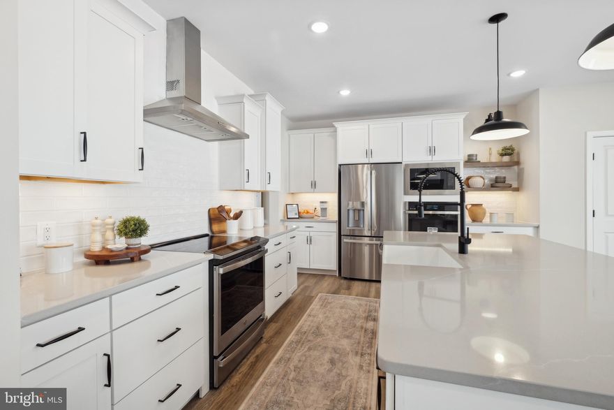 This home is in for permit and estimated to be completed in October 2026! Welcome to Estates of Tuscarora, a highly sought after community offering 1+ acre homesites within close proximity to commuter routes, shopping, parks, and Historic Downtown Martinsburg! The Canterbury 2-story colonial home located on a homesite #44 on 1.44 Acres. This 2-car garage, 5-bedroom, 3 bath home blends timeless Farmhouse interior design with modern convenience! Offering an open floor plan, this home is perfect for both comfortable living and entertaining. At the heart of the home is an inviting family room with a fireplace, seamlessly connected to the kitchen and casual dining area. The well-appointed gourmet kitchen features GE Profile Stainless Steel appliances with range, hood vent, built-in wall oven and microwave; complete with a spacious island with quartz countertops and a farmhouse sink. A finishing touch on the main level is a rare find – an extra bedroom and full bath on the main level, ideal for guests, in-laws, or a home office. The 2-story foyer leads to a boxed oak staircase with an open railing, creating an elegant focal point leading to the upper level. The upstairs includes a loft area, 3 secondary bedrooms, laundry room and spacious Primary Bedroom. The Primary Bedroom includes a walk-in closet, tray ceiling, and luxury bath with a frameless shower door and free-standing soaking tub. The unfinished basement and bath plumbing rough in provides an opportunity for additional living space after you get moved in. Don’t miss the opportunity to make this remarkable home your own! Call and schedule your personalized appointment today! Ask about our closing cost assistance with the use of KHovnanian American Mortgage! **Photos are of the decorated Canterbury Model Home and/similar home/features and may not reflect current home finishes. Pricing, options, and promotions are subject to change without notice. See Sales Consultant for more information**