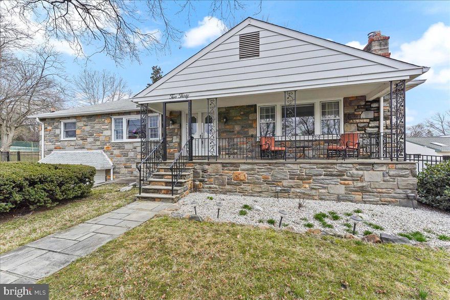 Welcome home to this beautiful stone rancher. Inviting covered front porch leads you into the foyer with wood floors throughout the dining room, living room and hallway. To the right is a large living room with fireplace and a wall of windows bringing in plenty of natural sunlight. To the left of the foyer is a dining room with another large front window making this another bright and sunny room. Off the dining room is an eat in kitchen with cherry cabinets, granite countertops, and an exit to the side patio and rear yard. The laundry room is also on this floor. Additionally there are three nice size bedrooms with ample closet space. The primary bedroom offers two closets and an updated bath with a stall shower with grab bars. The hall bath with linen closet completes this floor. The lower level is finished and offers a powder room, cedar closet, and a huge storage room. There is also access to the one car garage. This home is move in ready.