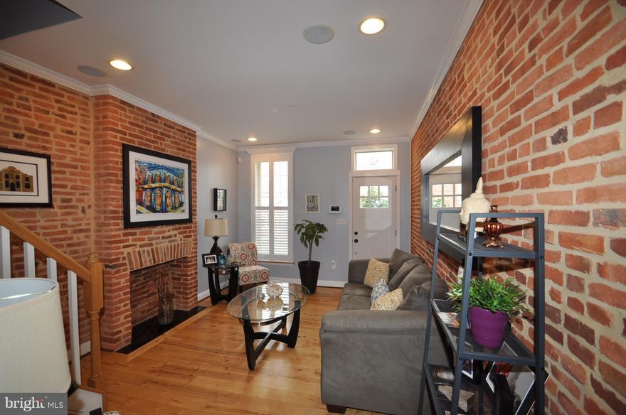 Move Right  in this Patterson Park   updated home with COVERED PARKING!!! Open floor plan.  Exposed brick. Coffered ceilings. Dine in Kitchen. Spacious bedrooms.  Finished lower level with full bath can be great 3d bedroom, home office or flex space.   Just seconds from JHU,  Fells Point, down town & all city living has to offer!!!  Pets case by case. Signed lease, security deposit + first month's rent due at move in.  Good Credit + employment verification required