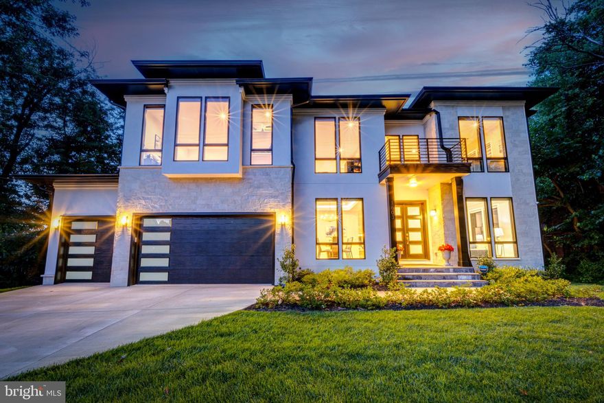 ****OFFERS ARE DUE ON JULY 18TH AT 5PM EST. No offers to be reviewed before deadline.****NEW estate, built in mid-2022, offers a 3-car garage, 7,315 sq. ft, with 7 bedrooms, 6.5 baths, 6 of them are ensuite baths, THEATER room, ABOVE GROUND WALKOUT basement, 7 walk-in closets, with a pool size backyard, this contemporary estate is located in the heart of Mclean, walking distance to many amenities. This home sits in the TOP 1% of public schools in the country! The primary bedroom retreat offers a KING-SIZED WALK-IN-CLOSET WITH AN ISLAND & EXCEPTIONALLY LARGE spa-like bathroom with 4 showerheads and massage jets. The utopian suite features a wet bar, wine fridge, and coffered ceiling. You'll love melting the day's stressors away in the luxurious spa bath featuring heated floors, a sumptuous soaking tub with a hand-held shower, a glass-enclosed rainfall shower with multiple massage shower jets, a built-in long vanity featuring black faucet accents, and stunning windows overlooking the back yard. 
The ultimate eat-in gourmet kitchen is every chef's dream, featuring DACOR appliances: a microwave, 2 ovens, a 6 burner DACOR cooktop with pot filler, a wine refrigerator, a 42" refrigerator, and a state-of-the-art 3-level dishwasher. Custom solid wood, soft close cabinets/drawers, under-cabinet lights, multiple oversized Quartz waterfall counters, and a gracious Quartz center island with a walk-in pantry provide enough space for all your non-perishables. The main level of this spectacular estate also features a formal living room, spacious dining room, and open-concept kitchen/family room that have easy access to each other, creating a seamless flow, ideal for entertaining and everyday living. A spacious work-from-home office with an ensuite bathroom and walk-in closet on the main could easily be used as a FIRST-FLOOR bedroom. An ample mud room conveniently opens to the garage, making loading and unloading groceries, sports equipment, and travel items a breeze. Upon entering the home, you'll be delighted by the soaring two-story foyer and bright, MODERN open-concept floor plan. Custom design elements include 10' ceilings, solid oak hardwood floors, a dramatic wide oak staircase, coffered ceilings, and Pella Lifestyle black floor-to-ceiling windows with designer zebra shades. Doors from your kitchen lead to a private deck - the perfect space for grilling. After meals, you'll love relaxing with your family members or guests in the adjacent family room with its linear gas fireplace, custom built-ins, and floor-to-ceiling windows. The 2nd level reveals a sitting area perfect for gaming or a library. Leading off the sitting area are 4 bedrooms, each with ensuite bathrooms. Each bedroom includes a walk-in closet.
Last but not least, there is a laundry room featuring a Samsung 2 washers in 1, so you could do two loads simultaneously, with the Smart Steam Sanitize function and 2 in 1 Dryer with Steam function, which will make laundry day loads of fun (plus saving you trips to the dry cleaners!) The lavishly appointed lower level is its escape retreat featuring an ABOVE GROUND WALKOUT, a game area, a 4-person island, a wet bar, a wine fridge, an exercise room, two bedrooms, one with a walk-in closet, and a full ensuite bathroom, and a phenomenal HOME THEATER. French doors on this level provide convenient access to the private backyard oasis. Finally, the private backyard features a patio surrounded by mature trees. Professional landscaping offers tremendous curb appeal and showcases the homes' sleek architectural design. The home provides a 10-year builder warranty! This prestigious McLean location offers walking distance to McLean Village, where you'll find restaurants, shops, coffee shops, parks and recreation, and a 5-minute drive to Tyson's malls. 15-minute drive to DC! Easy access to major hwys! Walking distance to many amenities makes this home ideal for an active lifestyle!
