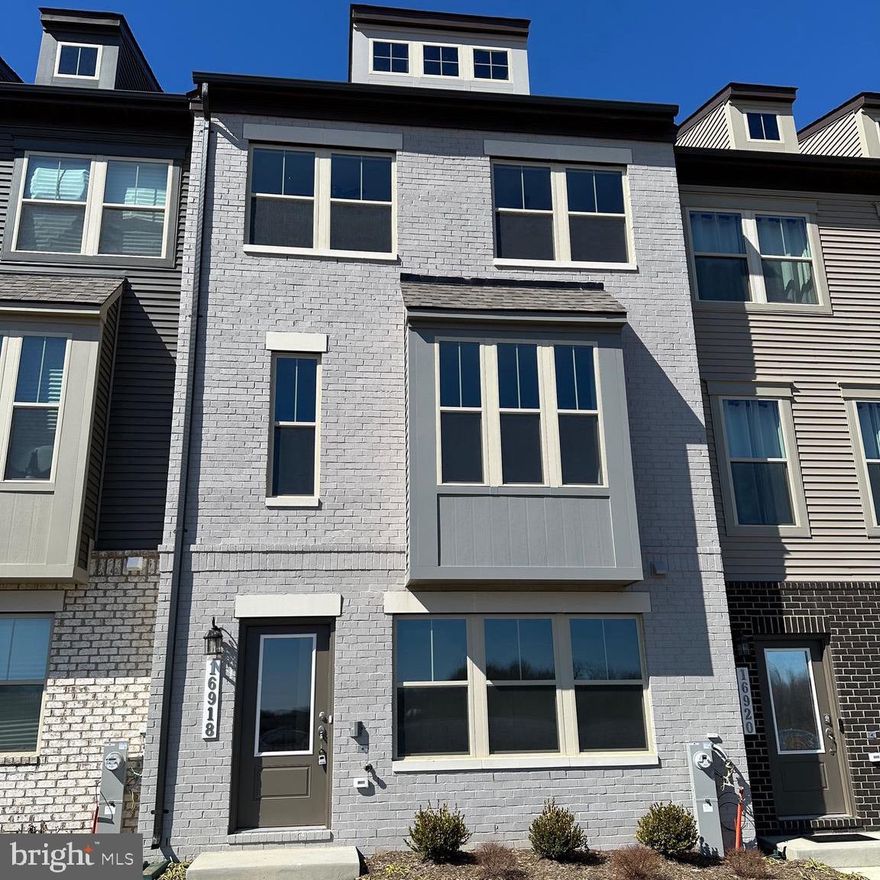 Welcome to this inviting interior townhome in Mill Branch Crossing, a walkable mixed-use neighborhood in Bowie, MD. The Jenkins is one of our most popular townhomes that features 3 bedrooms and 2 full baths on the bedroom level, and 2  half bath for added convenience one on the main level & on the basement level . The heart of this home is the kitchen with its spacious center island, featuring modern, stainless-steel appliances, and ample counter space for cooking and entertainment. Relax and take in nature from your deck. The finished lower level provides a flex area with a powder room perfect for a home office or secondary family room. This townhome is ready to rent, providing a comfortable and stylish living experience for the upcoming season.  Plenty of parking with two car garage & 2 car driveway.