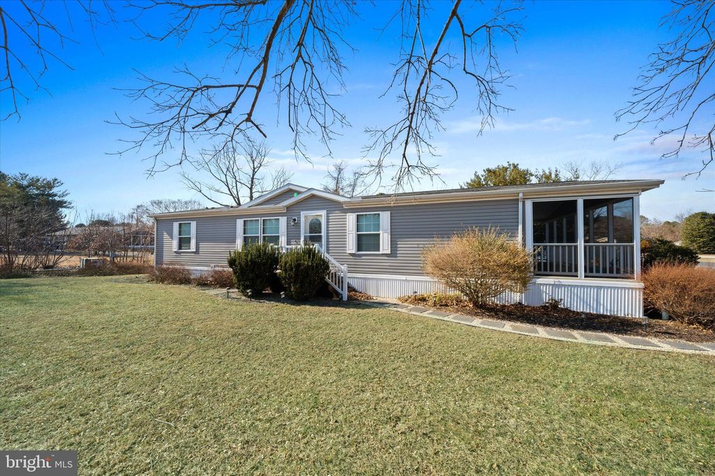 Photo of 25594 Crab Alley E, MILLSBORO, DE 19966 (MLS # DESU2103442)