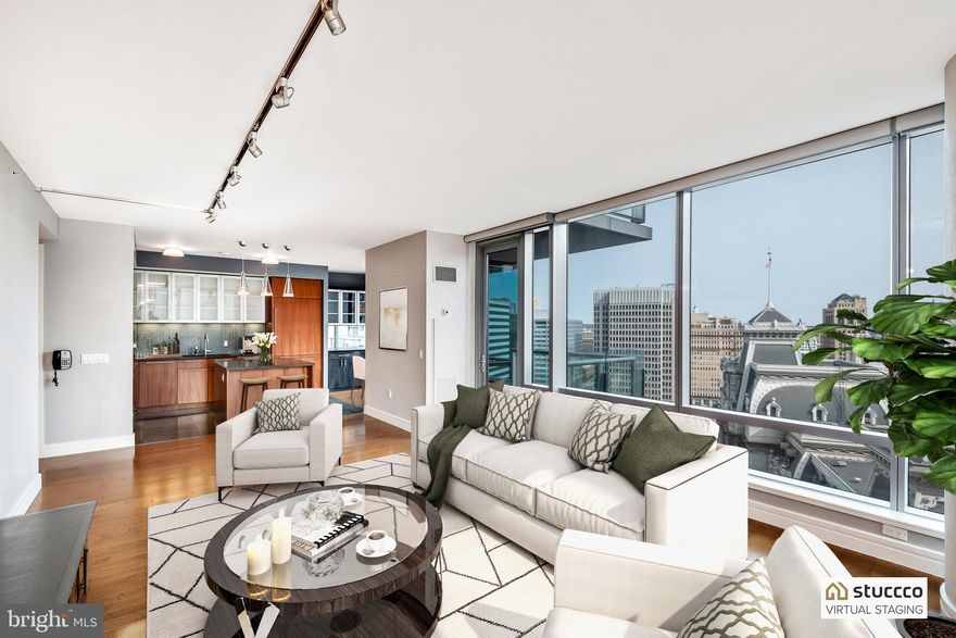 One of the most sought after floor plans  in The Ritz-Carlton Residences, and the only layout with a private balcony overlooking iconic City Hall with its clock tower, and Dilworth Park.  This 3-bedroom, 3 and a half bath beautiful home features wood floors in living areas, floor-to-ceiling operable windows, custom lighting, solar shades, custom built-ins and closets. 
One PARKING LICENSE included, in the on-site garage with 24-valet service.
The best of luxury living with access to world-class Ritz-Carlton services and resident-only amenities. These include 24-hour concierge, porter, and valet services; chauffeur service; a state-of-the-art fitness center; an indoor lap pool, hot tub, and locker rooms with showers; and a private yoga room. The resident lounge is perfect for daily use or private events at no additional cost. Additional amenities include a theater room, a newly renovated outdoor terrace with grills, dining areas, fire pits, and lounge seating, an on-site dog park, and a gated garden with direct access to The Ritz-Carlton Hotel.
 Hotel services such as 24-hour room service and catering are also available to residents at an additional cost, ensuring an elevated living experience with every luxury at your fingertips. This rare home combines spacious living, exceptional amenities, and breathtaking views—all in the heart of Philadelphia.