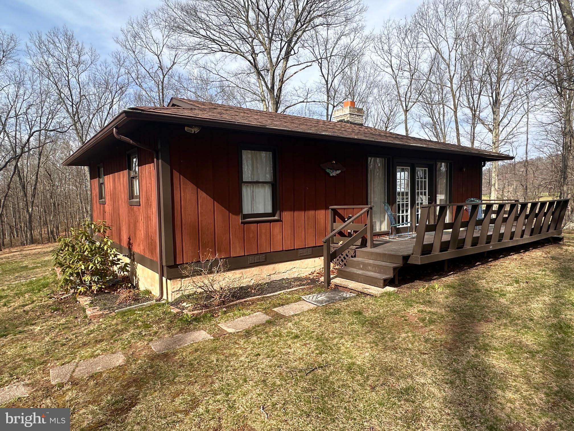 Beautiful home on almost 12 acres. Very nice pasture views and a great yard. Unrestricted land and great access for many roads, but off any main roads for peace and quiet. Detached Garage with upper level storage. 2 bedrooms, one bath with a wood stove and large sunroom. Front and back decks of each side of the home.