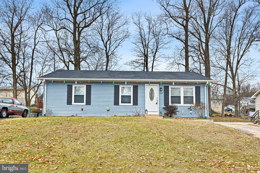 Welcome home to 123 N Tartan Drive located in the community of Buckhill Farms.  This charming 3 bedroom 1 bath ranch home is ready for its new owners.  As you enter the living room you will notice the gleaming hardwood flooring that caries throughout most of the home.  In the living room you will find recessed lighting with a ceiling fan.  Heading into the updated eat in kitchen you will find 42" white cabinetry with granite counter tops, a tile back splash, and stainless steel appliances to include a beverage fridge.  Just off the kitchen is a convenient laundry area.  Just down the hall you will find an updated bathroom with an upgraded vanity and a custom tile shower with glass doors.  In each of the bedrooms you will find carpeted flooring, ceiling fans, and updated interior doors.  Heading out to the rear yard you will find a spacious rear deck perfect for entertaining or relaxing outdoors.  Put this home on your list to tour, it will not disappoint.