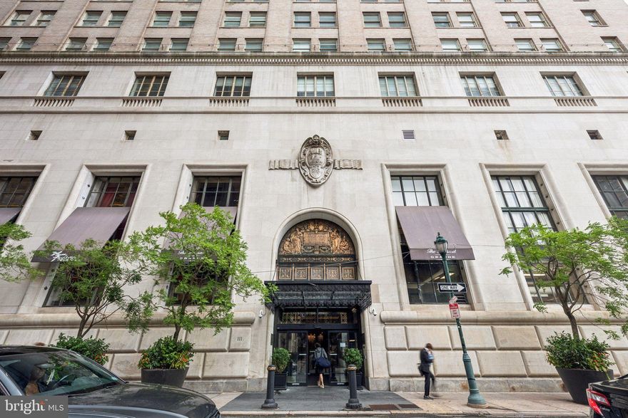 Welcome to life in the heart of Rittenhouse at the distinguished Packard Grande. This full-service building offers 24-hour front desk service, a beautiful lobby rich with original architectural details, a spacious resident lounge, conference room, shared balcony with sweeping Center City views, and a bright, well-equipped fitness room.

Step inside to a spacious kitchen with abundant counter space, stainless steel appliances, wood shaker cabinetry, granite countertops, and a breakfast bar that overlooks the bright living room with unobstructed city views. Just off the living room, you'll find a large, comfortable bedroom with a walk-in closet and a stylishly renovated bathroom. Enjoy the convenience of newer, in-unit laundry. Perfectly positioned just steps from Rittenhouse Square and surrounded by some of the city’s best shops, dining, and everyday conveniences, this condo offers the ultimate Center City lifestyle.