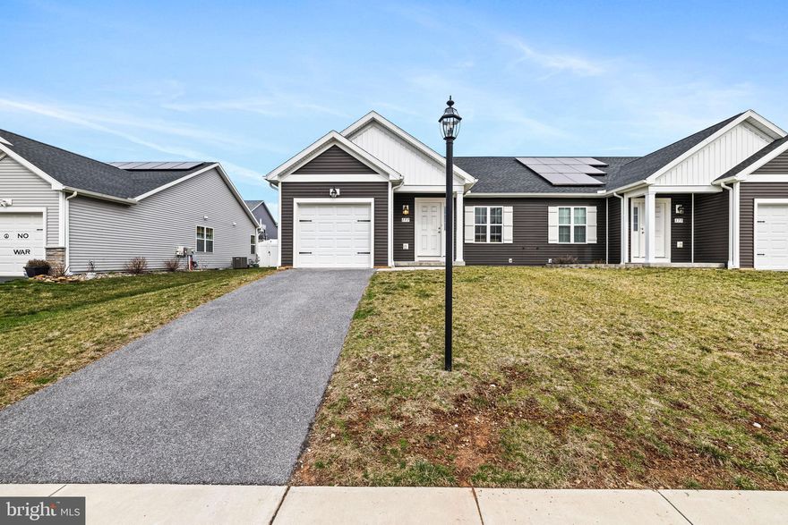 Welcome home to 177 Skyview Cir in Hanover PA! This 2 bedroom, 2 full bath rancher, built in 2021, offers modern finishes and a low maintenance lifestyle in a convenient location. Step inside to an open floor plan with vaulted ceilings in the great room, seamlessly connecting the living, kitchen and dining areas. Luxury vinyl plank flooring runs throughout the main living spaces with carpet in the bedrooms, complemented by recessed lighting for a clean, updated feel.

The kitchen features an L-shaped layout with an island, stainless steel appliances and ample cabinetry, creating both functionality and flow. The primary bedroom includes a walk-in closet and a private full bath with a tub, while the second bedroom is served by a full hall bath, also with a tub. Main level laundry adds everyday convenience.

The full basement offers a complete footprint of the home with partial daylight and is ready to be finished to suit your needs, whether for additional living space, a recreation room or storage. Outside, enjoy a fully fenced backyard with a vinyl privacy fence and a patio accessed through sliding glass doors. A one car attached garage and easy to maintain lot complete the property.

Conveniently located near Route 94 and Route 116, with easy access to the Maryland line, this home offers both comfort and accessibility. Schedule your private tour today.