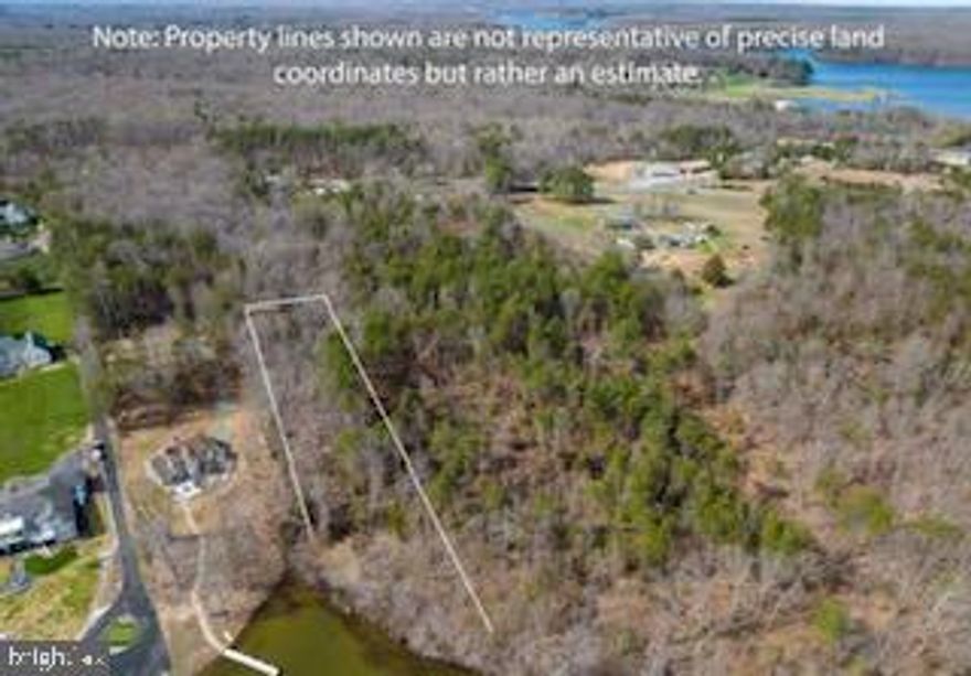 Lake Anna waterfront Lot with No HOA!!! This 1.5-acre lot is shared waterfront but it checks so many boxes, it's on the public side of the lake, secluded, and minutes from the grocery store, state park, restaurants, and marinas. You will love the privacy and convenience of being on the public side. This property offers the ultimate blend of luxury, comfort, and natural beauty, making it an ideal retreat for those seeking a peaceful waterfront lifestyle. This lot is shared waterfront.  Bring your builder and get started today! See plat in documents!