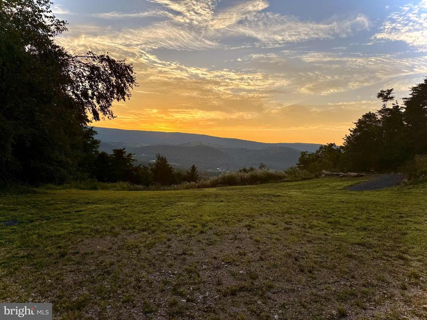 Come build your dream home with this beautiful view of Jack Mountain. This lot is partially cleared with an installed driveway and just ready for your home vision to come to life. There is already an approved perc certification on file. Don't miss the opportunity to own this piece of "Almost Heaven".