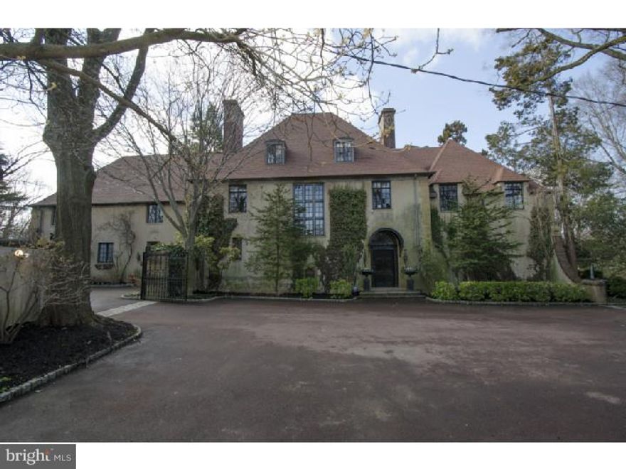 Two homes for the price of one - each one is a treasure! Outstanding architectural details in the main house and 3 Bedrooms, 2 Baths in the charming cottage. Main House - 1st Floor: Reception Hall, grand Living Room (23 x 40) with massive fireplace, arched windows, display cabinetry, and an amazing entertaining space. 25 foot Dining Room with fireplace, Cherry Family Room with fireplace. Huge Kitchen, Breakfast Room, Powder Room and Laundry/Sitting Room.  2nd Floor: Master Bedroom with fireplace and Master Bath, 5 Bedrooms and 3 full Baths, exercise Room and Office, and back stairs.  Basement is a spacious Rec. Room with fireplace, bar, and storage galore.  Guest House - 1st floor: Living Room with fireplace, Dining Room, modern Kitchen opens to Sun Room, and Master Bedroom with Bath. 2nd floor - 2nd Bedrooms and full Bath. Beautiful lot with pool verandas, court yard.  A rare find!