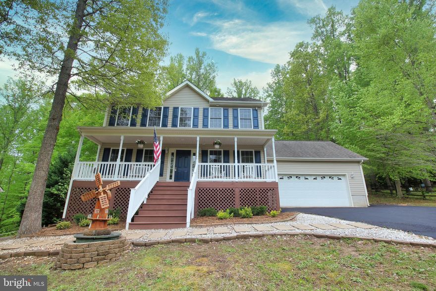 This slice of paradise is nestled away in the fabulously peaceful Presidential Lakes community.  Offering 4 bedrooms, 2 1/2 baths with more than 2100 finished square feet, and a full unfinished basement that affords abundant room to grow and create your own ideal space.--------- Step inside and it looks and smells just like a new home as it has been freshly painted and has new carpet throughout  Inside you will find an open floor plan with super spacious family room off the kitchen.  The family room features a cozy gas fireplace for those cooler nights and mornings that occur here in Virginia. --------- Upstairs you will find 4 bedrooms, including a master suite with a walk-in closet, again all freshly painted and with new carpet to make it truly move-in ready.--------It also offers a full, unfinished basement with over 1000 square feet of space for storage, or ready to build in the rooms you desire to complete your dream home. ---------------- Come on outside and step into an outdoor lovers oasis.  Fully ready to entertain with a sizeable deck, hot tub and above ground swimming pool.  Perhaps you can even cozy up to the fire ring with you favorite beverage and watch the sunset. -------------- Oh, yeah, lets not forget the treehouse that is nestled just inside the treelike behind the house, sitting idly by and waiting for all those with creative imaginations come and make memories.  ------------- Your dream home awaits here at 6411 Wheeler Drive in Presidential Lakes.  Come take a look today.