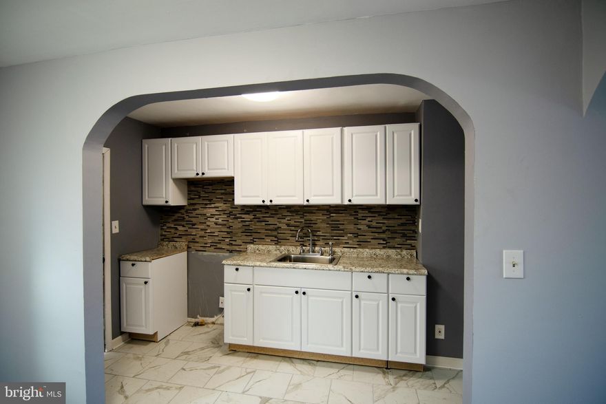 Turnkey 2 bed 1 bath townhouse in Morell Park. Fresh Paint, new flooring throughout & new kitchen w/ Stainless Steel Appliances. Rental comps approximately $1200. Perfect for buy & hold investors & home buyers! 5 Mins from Downtown Baltimore, close to i95, i695, Ravens/Orioles stadium & Federal Hill! Ask Hans how to get $5000 toward this home & Lease with the right to purchase option for homes $150k - 450k. Veteran 0% down program available. Text L/A to see Virtual Tour of this home. Combo deal with 4509 Umatilla Ave available