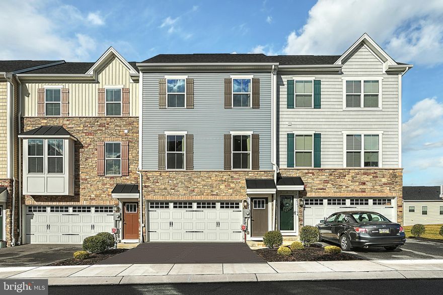 Don't miss your opportunity to own this large townhouse in the popular Regents Glen neighborhood with loads of upgrades! Features include 3 bedrooms, 3 full and 1 half bathrooms. an open 1st floor with 9 foot ceilings and luxury vinyl plank flooring throughout. The high end kitchen with a massive center island, granite counters, stainless steel appliances and walk-in pantry is just steps away from the dining room with large windows, half bathroom and living room with access to the expansive trex deck perfect for relaxing outdoors. The upper level features a primary bedroom suite with a walk-in closet and an attached full bathroom with a dual vanity, soaking tub and a separate shower. There are 2 additional bedrooms, another full bathroom and a laundry room on this level as well.  Finally the main level features a den/4th bedroom with walk-out access and another full bathroom that is perfect for all your entertaining needs or for guests to stay the weekend. This home is a must see to appreciate all it has to offer!