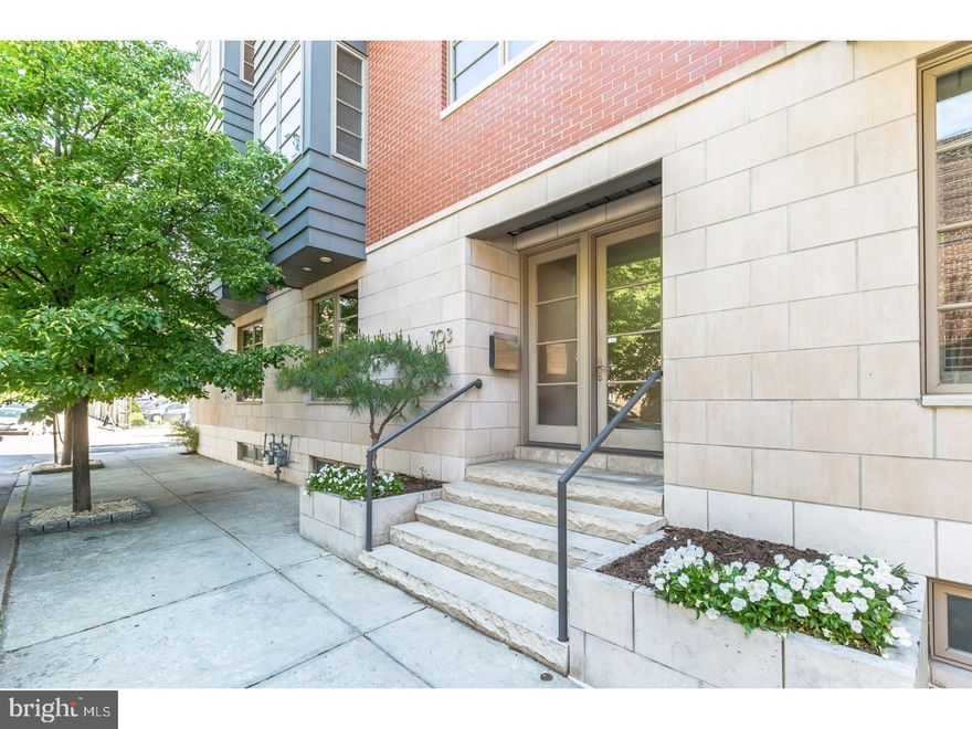 Fall in love with this beautiful Graduate Hospital 4 bedroom townhome situated as part of a private gated community, and including three car parking, incredible city views, and premium appliances! Enter into a foyer with guest suite, currently being used as an office space. On the second floor the living room hosts wide plank Brazilian Cherry floors, soaring ceilings, beautiful built ins, a large sunny private deck, and a half bath. The kitchen features glass fronted custom cabinetry, under counter lighting, and stainless steel premium appliances - including a 36" sub-zero refrigerator and integrated wine chiller, Wolf stove, and integrated Miele whole bean coffee system. Upstairs, the master suite offers ample storage space with two walk-in closets and a spacious bathroom with dual custom vanity and steam shower. Two additional bedrooms share a bathroom with oversize jacuzzi tub, and purpose-built laundry facilities. The roof deck offers impeccable views of the city skyline as well as a 5 person hot tub/spa! Basement is finished and includes a large movie/games room and second large room currently used as a playroom. This gorgeous home comes equipped with a full security system including external video cameras and a DVR recording system, 3 bicycle motorized ceiling hoist in garage, home elevator, whole house sound, wifi and network systems, and an intercom with external video camera access on every floor. Just a quick walk into Center City, and close to neighborhood spots like The Cambridge, Little Spoon Cafe, Tio Flores, and Marian Anderson Park. You won't want to miss the opportunity to own this luxurious home!