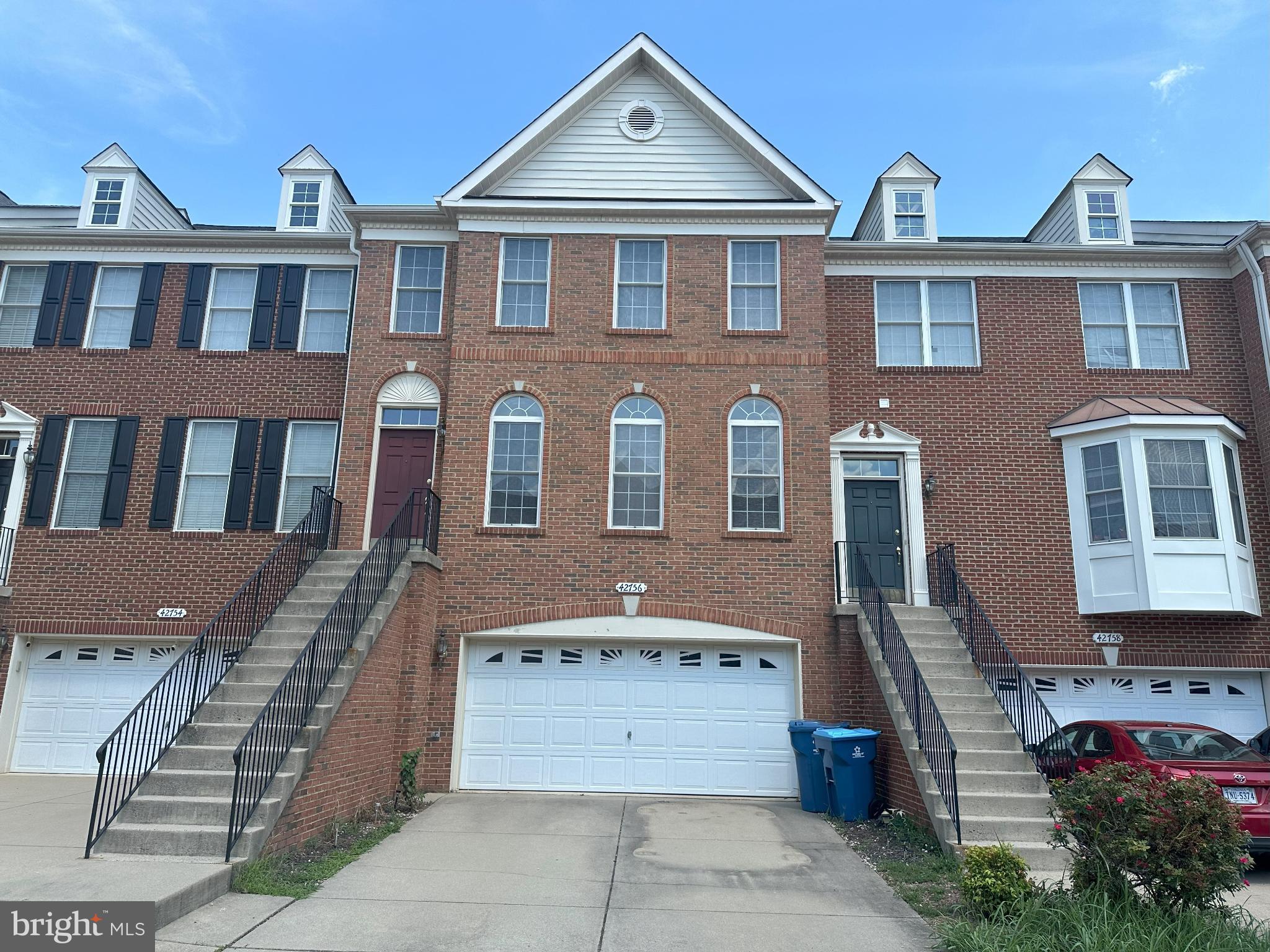 Discover the charm of this beautifully maintained Colonial townhouse in the desirable South Riding community. With 3 spacious bedrooms and 2.5 bathrooms, this home offers a perfect blend of comfort and functionality. The inviting interior features a cozy gas fireplace, ideal for creating warm memories during chilly evenings. The heart of the home is the large gourmet kitchen, equipped with modern appliances including a built-in microwave, cooktop on the island, dishwasher, and wall oven, making meal preparation a delight. Enjoy the convenience of a washer and dryer on the bedroom level, ensuring laundry days are a breeze. Walk-in level finished basement offers a huge REC room that can be used as additional 4th bedroom and an updated 3rd full bathroom. Step outside to your private deck and patio, perfect for entertaining or simply unwinding after a long day. The community amenities are truly exceptional, featuring outdoor pools, tennis courts, and scenic walking paths around the lake, fostering an active and vibrant lifestyle. 2-car garage and a large driveway provides easy parking for owner and guests. Shops, stores, eateries, and outdoor amenities (volleyball court, basketball court, fishing pond) are nearby. This home is available for lease immediately, with flexible lease terms ranging from 24 to 36 months, providing you with the stability you desire. Experience the joy of living in a community that prioritizes comfort and recreation. Schedule your visit today and envision your future in this delightful home!