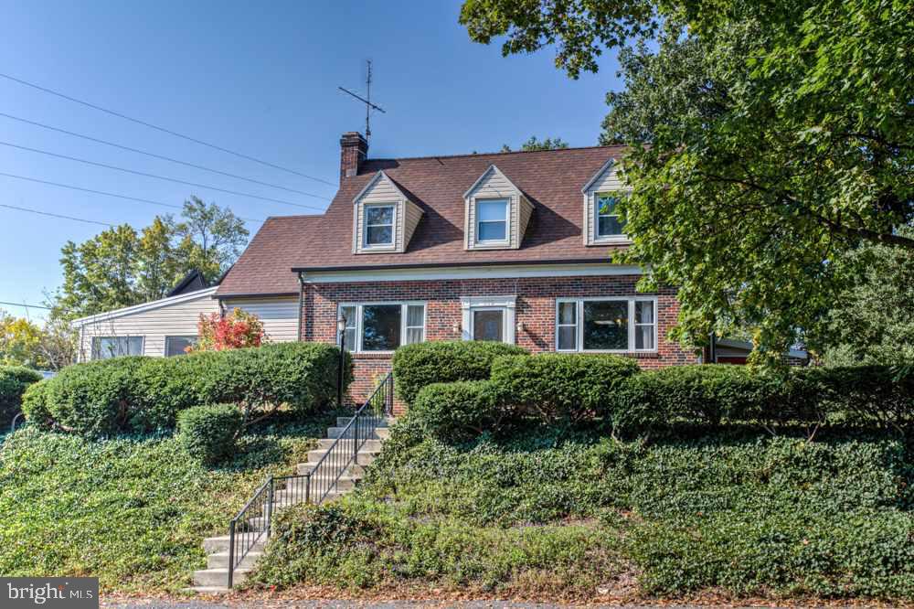 Charming cape cod w/a lot to offer. 3 bed, 2.5 bath. Light & bright living room w/hardwood flooring and a wood fireplace. Modern kitchen with laminate floors and a center island that separates the kitchen from the spacious open dining room with hardwood flooring. Oversized sunroom opens to large, private backyard w/storage shed. Finished LL for additional living space.