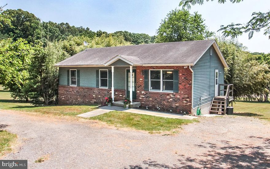 **OFFER DEADLINE 6/25 2pm **Tucked back a fairy tale winding drive,  this charming 3 bedroom, 3 full bath rancher is a hidden GEM!!  The property is made up of 1.6 clear acres with serene private views of rolling fields,  and enough land for volley ball games, camp fires, and more.   Inside this home is an open canvass ready for your ideas.   Not only is there deck access from the main level, but the lower level Rec Room also receives full daylight with a second French door to patio access.    An extra room with its own full bath would make a great work from home space here.   Right on the edge of the watershed, this private bucolic setting is in the heart of Hereford Zone Schools, close to hiking trails, and yet still easy commuting access.
Please no driving up Compass Lane, which is a private shared lane without an approved appointment.  Showings by Appointment only.
*This is an AS-IS Property. Seller will make no repairs.
** Multiple Offers Received- Offer Deadline 6/25 at 2pm- please submit highest and best.**