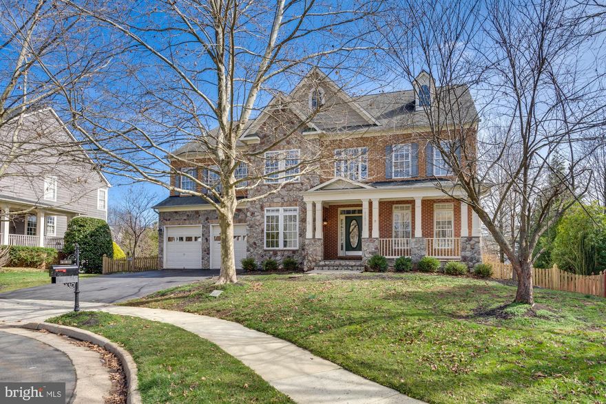 Stunning Faulkner model home located in the highly sought-after Broadlands neighborhood is a true gem. This three level home in a quiet cul-de-sac features 7 bedrooms, 6.5 bathrooms, 6,200 square feet, and is sited on 0.24 acre lot. It boasts an array of sleek features hardwood flooring, pre-wired ceiling speakers, chair railing, recessed lighting in the formal living room and dining room. The gourmet kitchen is a standout feature, boasting natural cherry cabinets, center island with cooktop, granite countertops, and butler's pantry that will surely appeal to any cooking enthusiast. The main floor includes a family room with a fireplace, office, laundry room, and half bath. Main level bedroom with en suite bathroom offers convenience and flexibility for guests or family members. Upper level owner's suite is a luxurious retreat, complete with a sitting room, a cozy gas fireplace, and en suite bathroom providing a perfect sanctuary within the home. Four additional bedrooms and three bathrooms on the upper level. Finished expansive walkout lower level with 8-foot ceilings, fireplace, and abundant natural light offers endless possibilities for entertainment and relaxation. Additionally, the lower level also features a bedroom and bathroom. Outdoors features a fully fenced spacious well maintained backyard with underground sprinkler system. Welcoming covered front porch with lots of curb appeal, a two car garage, and driveway. Short drive to shops and restaurants. Nearby Mill Run, Eagle Ridge, Briar Woods pyramid.
