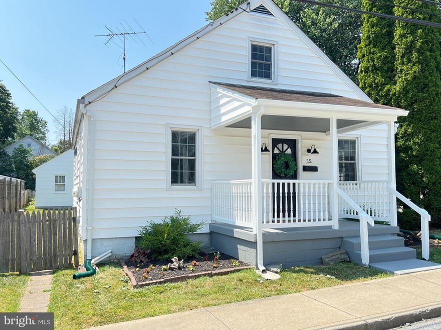 This lovely 3 BR, 1 BA home is button cute! You will really enjoy the freshly finished hardwood floors, the vinyl, double-paned windows and the updated kitchen! This house features a main floor bedroom, so stair-challenged owners will love this house! Both the dining room and the living room are excellent spaces to entertain guests. The kitchen is super cool with that certain special verve; this ain't no Home Depot cookie cutter kitchen. The basement is partially finished and can serve as either an office or a small den. The unfinished area is ready for your spatial vision!

<br><br>
The backyard is perfectly flat and has ample play area. The one-car garage can serve as a workshop or protect your car from the elements. Have a dog? This house is fully fenced to keep your furry friend close by!

<br><br>
This great home is conveniently located minutes away from McDaniel College, a gorgeous park, stores, and more! One year home warranty included. Basement heater as is.