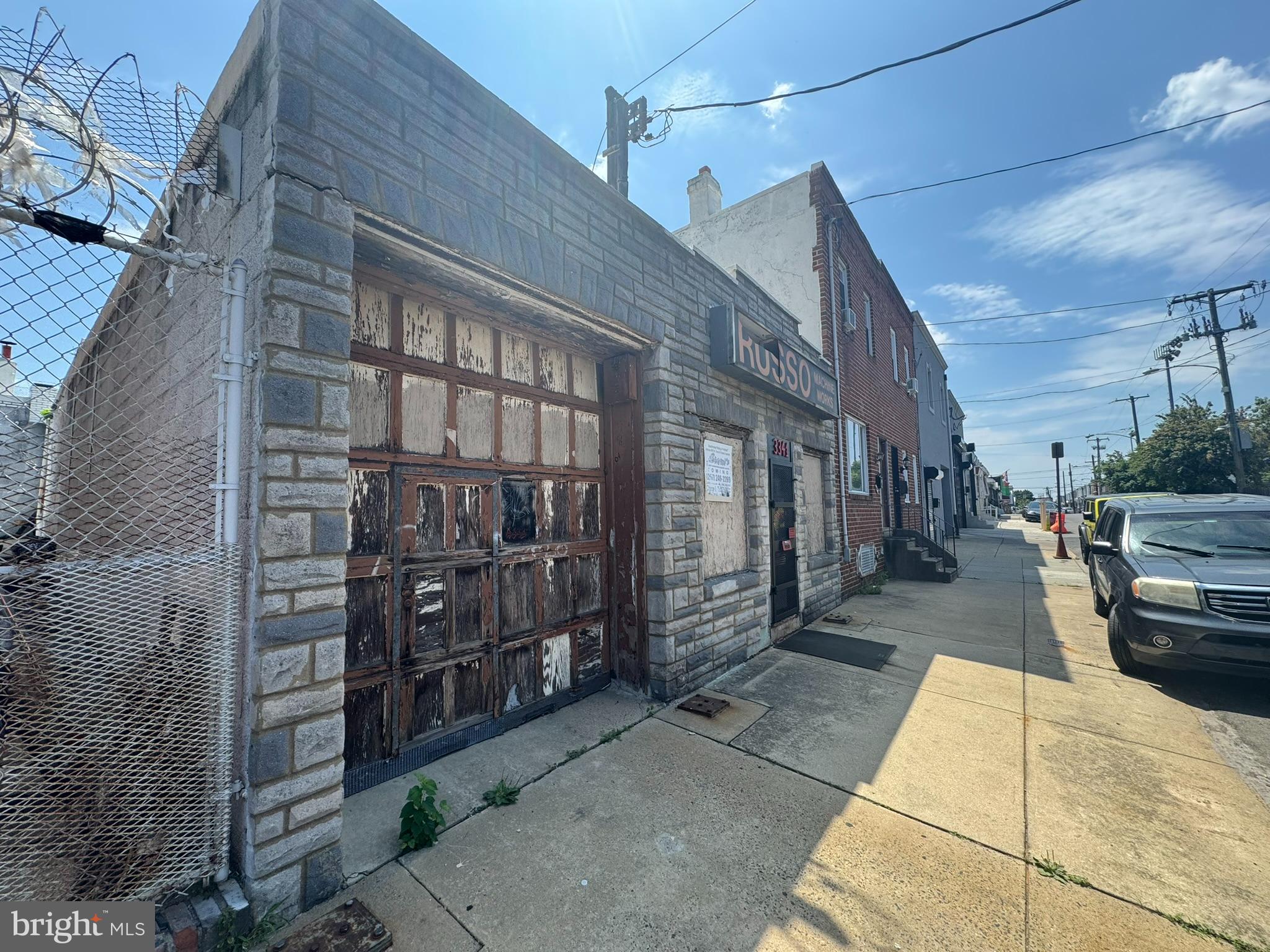 Versatile 3,700 SF Garage + Apartment
Fully Outfitted & Move-In Ready
Rare opportunity to own a meticulously maintained industrial flex space with serious character. This 3,700 SF property includes a fully functional machine shop/garage with a roll-up door and ramp, private alley access, crane, mezzanine office, and $45K+ in included machinery and equipment—plus a forklift. The standout feature? A hidden trap door connects the workspace to a private, upgraded apartment with in-unit laundry. New LED lighting, secured entry, and a rock-solid roof make this turnkey setup ideal for owner-users or creative investors. A true gem with unmatched utility and charm.
Perfect for Contractors, Fabricators, and Small Business Operators
Whether you're a machinist, fabricator, contractor, or service-based business, this space is built for efficiency and functionality. The layout is optimized for production and storage with a functional crane, high-capacity roll-up door, ramp access, and multiple work zones. A small mezzanine office offers space for admin operations, while the included heavy-duty machinery and forklift save time and capital. The attached apartment—accessible through a unique trap-door tool bed—provides live/work potential or added rental income. Upgraded systems, secure access, and long-term ownership pride make this an exceptional opportunity in a rapidly developing pocket of Philadelphia.