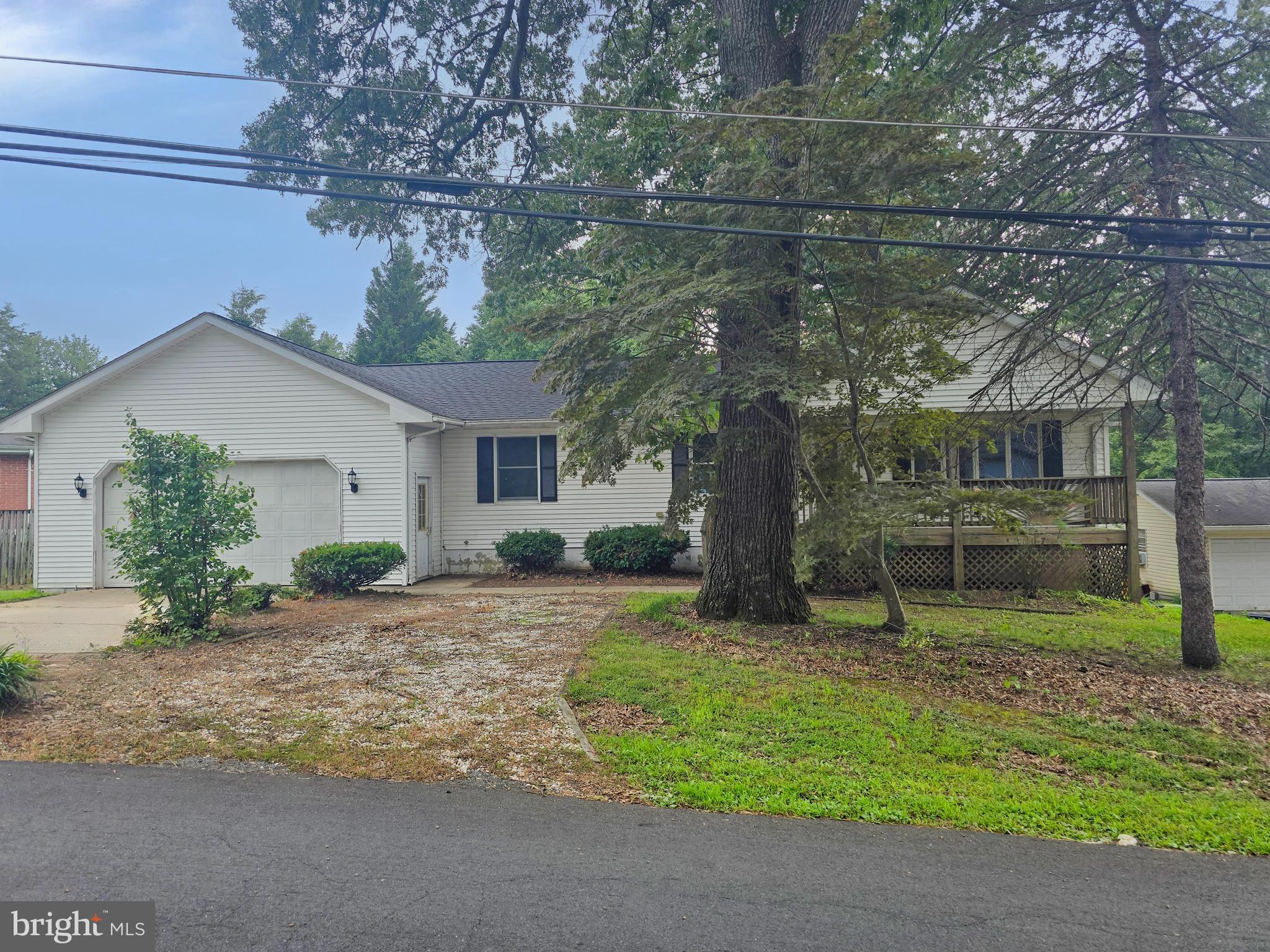 *Endless Potential in Sunrise Beach!**
Bring your vision and unlock the full potential of this **spacious single-family rancher** located in the desirable **Sunrise Beach community of Anne Arundel County**. Nestled on a **generously sized lot**, this home offers a quiet, peaceful setting with **mature trees** and a **fully fenced backyard**—perfect for privacy, pets, or outdoor entertaining. Step inside to discover **3 full bathrooms** and a **huge primary suite** featuring its own **private bath** and **direct access to a sprawling rear deck**—ideal for enjoying your morning coffee or unwinding in the evenings.
Additional highlights include:
* **Oversized garage** with plenty of storage space
* **Expansive rear deck** for gatherings or outdoor living
* **Large lot** with room to garden, play, or expand
While this home **needs significant work**, it's a solid investment opportunity in a **sought-after waterfront community** with tons of potential. Whether you're an investor, contractor, or buyer looking for a fixer-upper to make your own, this property is **sold 100% AS IS** and priced accordingly.
Don’t miss the chance to build sweat equity in one of Anne Arundel County’s most charming neighborhoods. Property will not qualify for standard financing. Cash, Renovation loans, cash or hard money only.