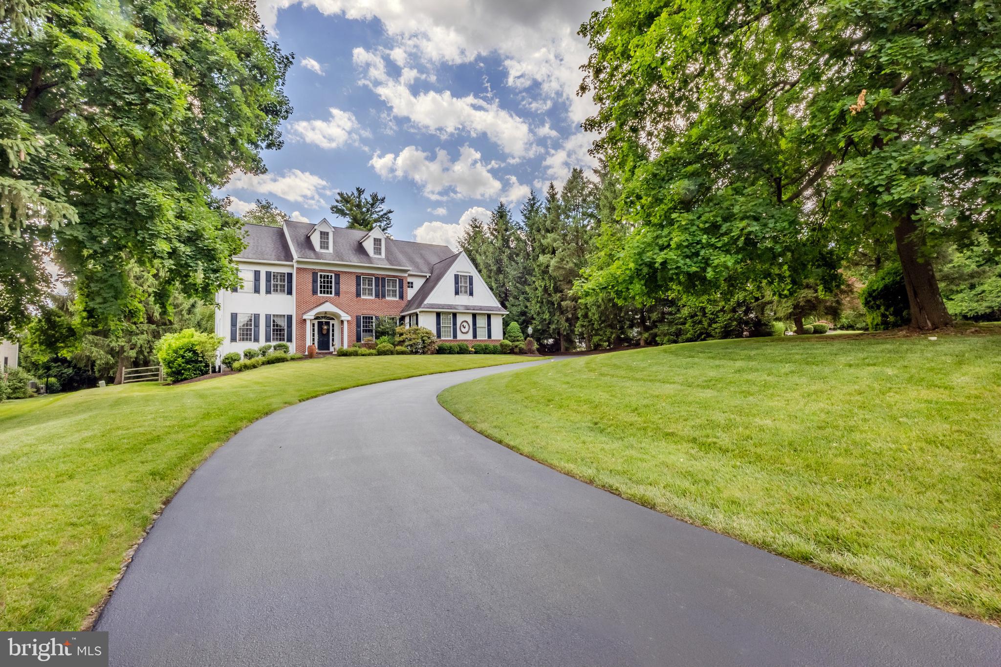 Welcome home to 1140 Waterloo Road! This stunning 4 bedroom, 3.5 bathroom home offers wonderful space to enjoy, both inside and out. The curb appeal is immediately evident as you wind up the driveway to this stately home. A beautiful two-story foyer welcomes you in at the covered front door. To the left you will find the bright formal living room, the first floor powder room, and a great bonus room that can serve as a den or a home office. To the right of the foyer is the dining room, which flows seamlessly into the open kitchen and great room space that features a large center island with seating, and a great amount of storage space. A great eat-in breakfast room connects the kitchen to the great room, which features vaulted ceilings, a cozy brick fireplace, and surrounding built-ins. The finished walk out basement is the perfect space to play a game of pool or air hockey, watch a movie, entertain guests or simply hang out. Upstairs on the second floor you will find the most spacious primary suite that features the large bedroom with coffered ceiling, a sitting or exercise room, and a connected office. The space continues with two walk-in closets, and a large en suite bathroom with double sinks. Down the hall from the primary is the second bedroom with its own en suite bathroom with a stand up shower. The third and fourth bedrooms share the hall bath and both feature beautiful plantation shutters. Off of the great room downstairs, sliding doors lead to the deck which overlooks the stunning and very private park-like backyard. This outdoor space is the perfect place to entertain and enjoy for years to come. 1140 Waterloo also features a three car attached garage with interior access with plenty of storage, a large attic space, and the HVAC and hot water heater were just replaced in 2024! The current owners have loved and cared for this home for over 20 years and are now ready to pass it on to the next stewards. Offering an exceptional location with easy access to all things Main Line and Chester County. This home and its location will never get old! Book your showing today.